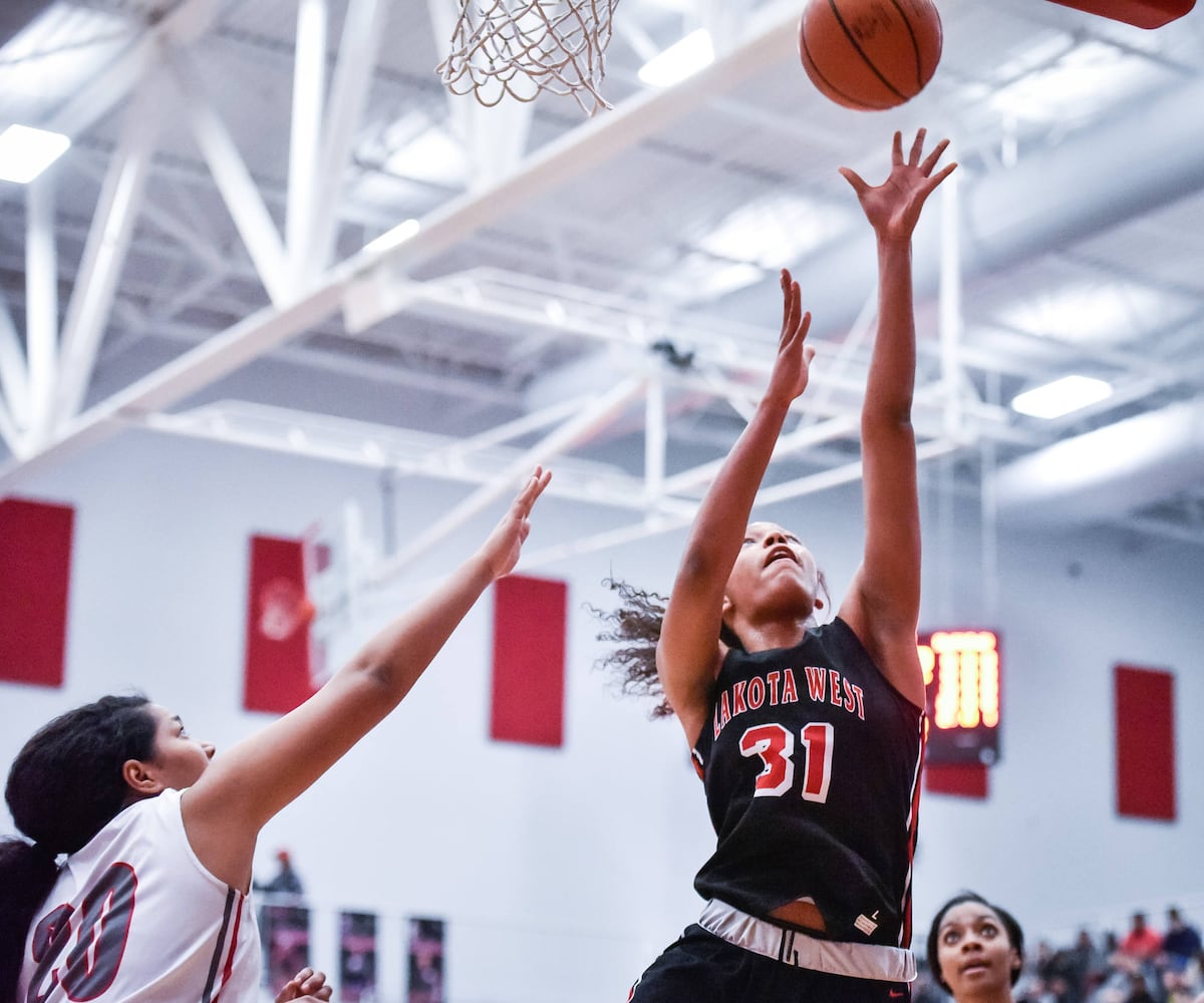 Lakota West girls basketball beats Princeton to give coach Fishman 400th win