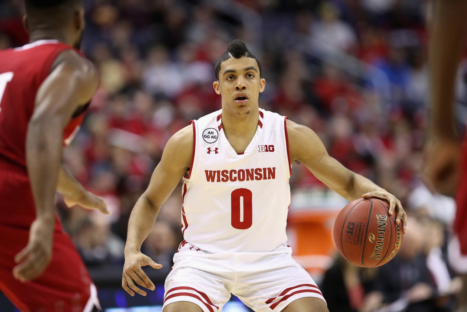 WASHINGTON, DC - MARCH 10: D’Mitrik Trice #0 of the Wisconsin Badgers dribbles the ball against the Indiana Hoosiers during the Big Ten Basketball Tournament at Verizon Center on March 10, 2017 in Washington, DC. (Photo by Rob Carr/Getty Images)