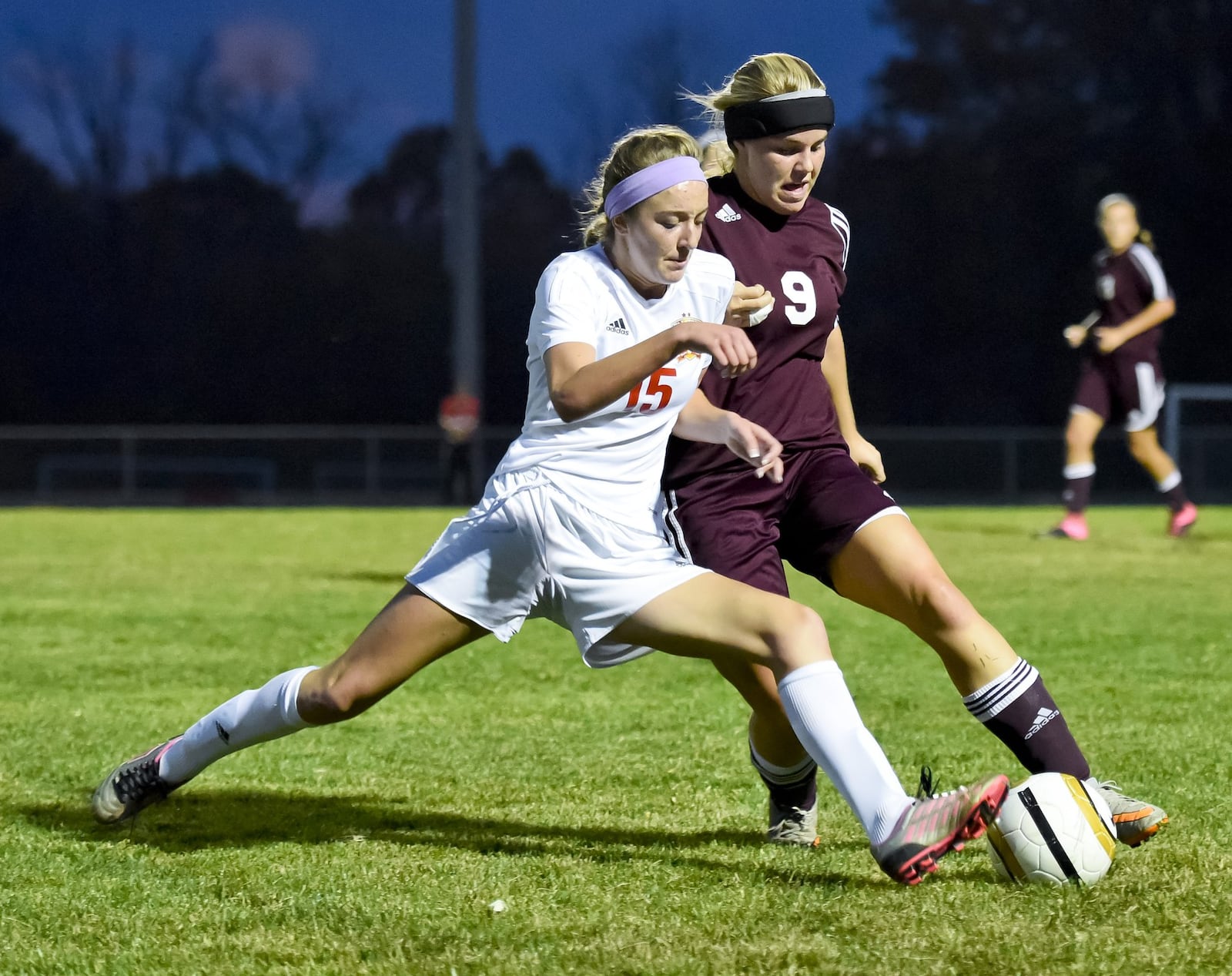 Fenwick’s Alexandra Page (15) and Christy Schmitt (9) of Ross battle for the ball during their Division II sectional girls soccer game Oct. 22, 2015, at Fenwick. NICK GRAHAM/STAFF