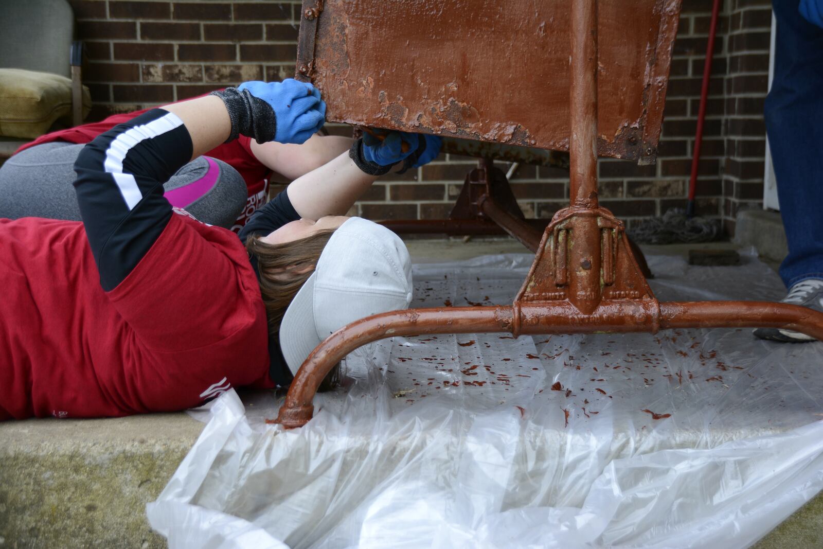 Fairfield Twp. will renew its annual spring cleanup day on April 10 in conjunction with Habitat for Humanity's Rock the Block program, though Habitat's community projects will span the Greater Cincinnati region. Pictured is work during Habitat for Humanity’s Rock the Block in April 2019 in Fairfield Twp. During that event, hundreds of volunteers filled more than 11 Dumpsters with trash and debris from the Five Points area. MICHAEL D. PITMAN/FILE