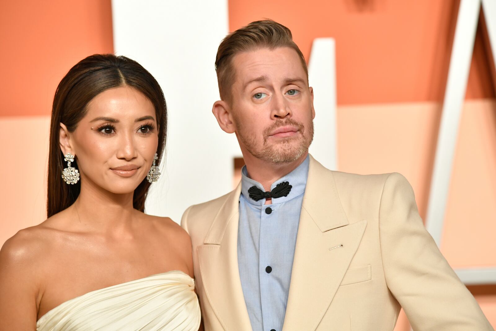 Brenda Song and Macaulay Culkin arrive at the Vanity Fair Oscar Party on Sunday, March 2, 2025, at the Wallis Annenberg Center for the Performing Arts in Beverly Hills, Calif. (Photo by Evan Agostini/Invision/AP)