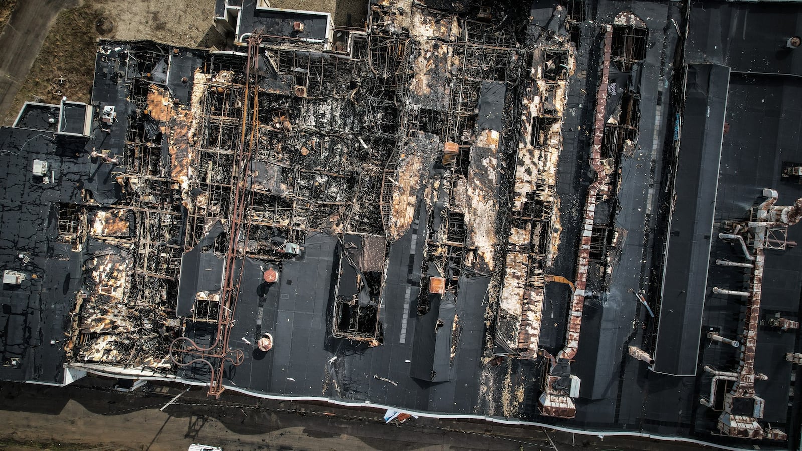 Much of the roof of the Wright Company Factory site has been damaged from an Sunday morning fire. JIM NOELKER/STAFF