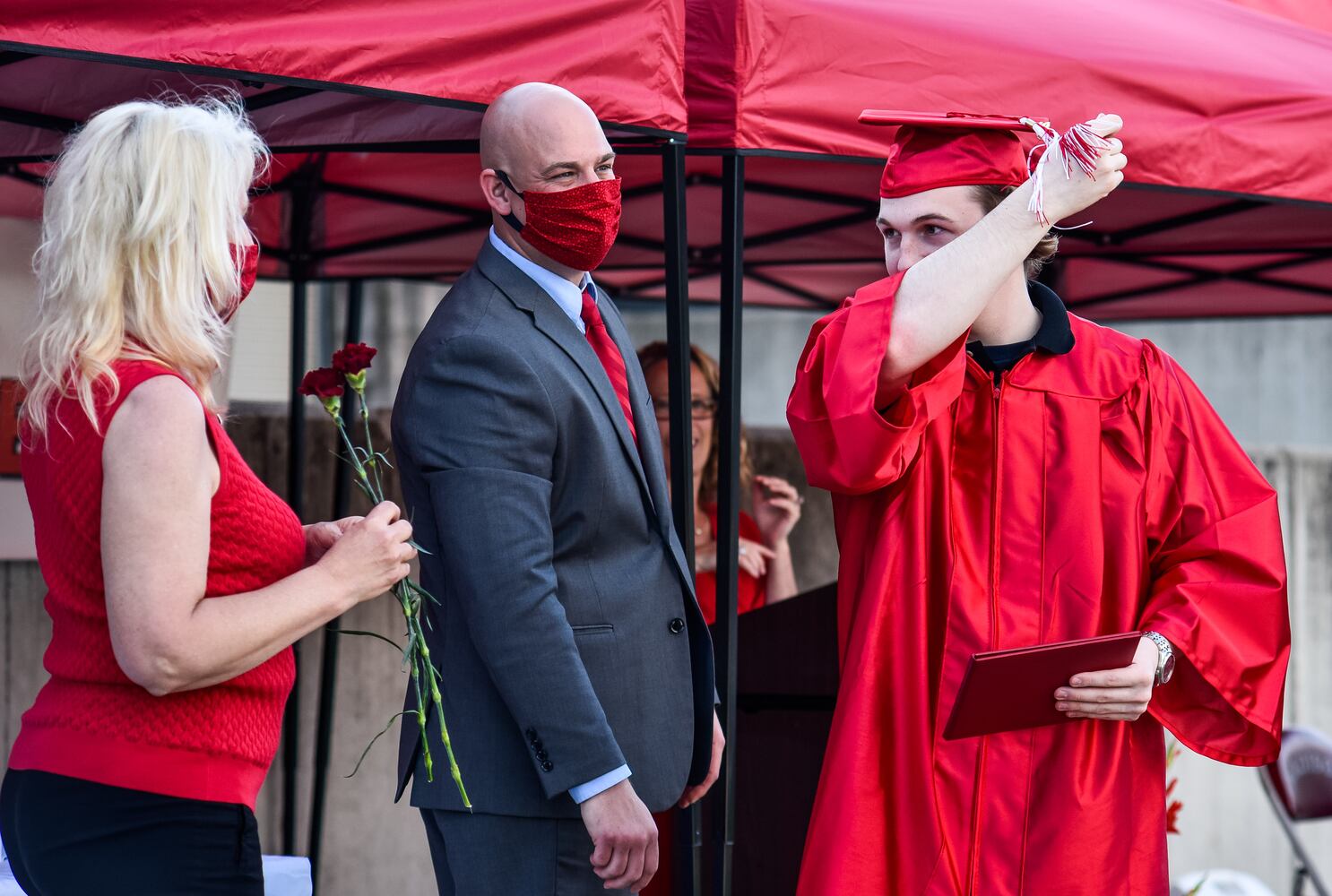 Madison High School drive-thru graduation ceremony at Land of Illusion