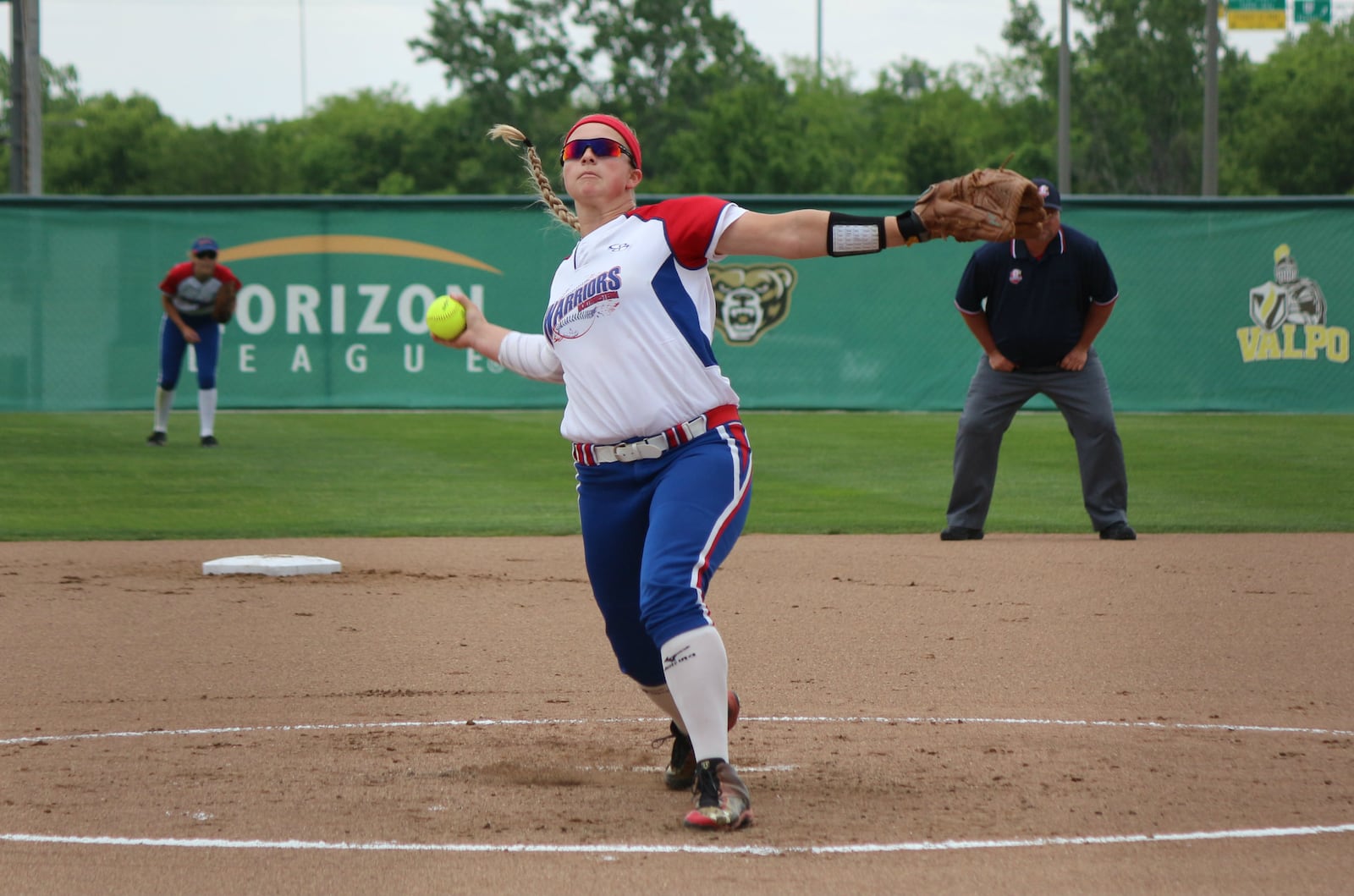 Springfield Northwestern’s Jenna Robbins fires a pitch during her one-hitter against Badin on Wednesday in a Division III regional semifinal at Wright State University. CONTRIBUTED PHOTO BY GREG BILLING