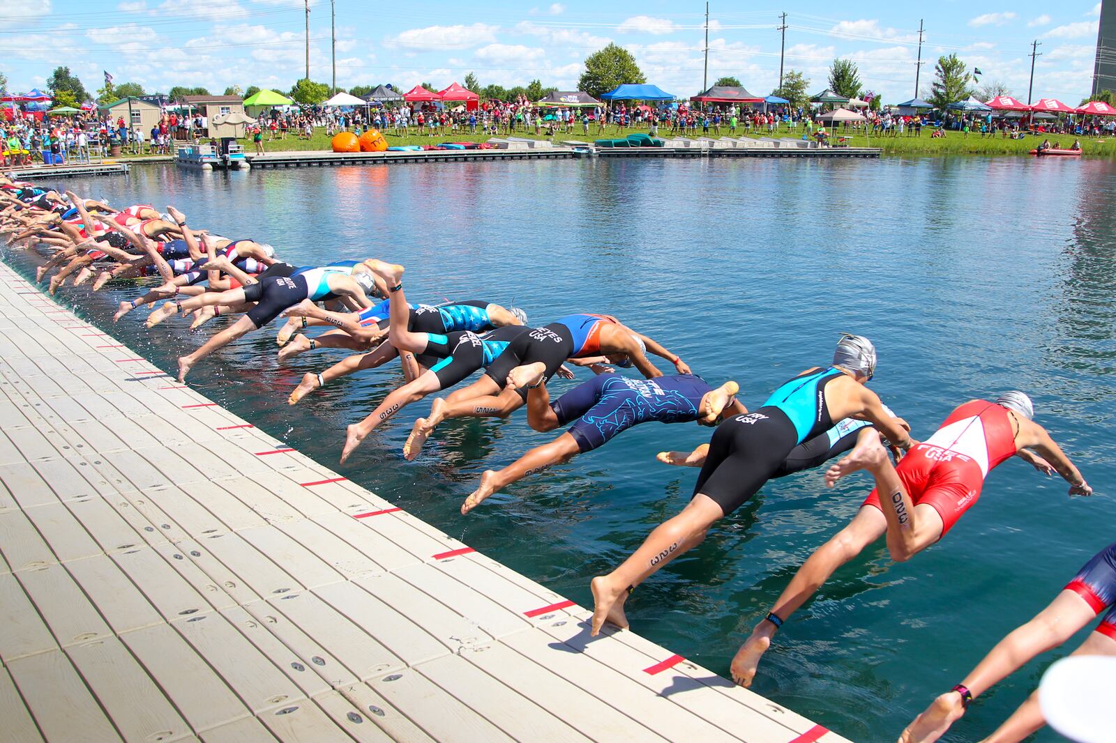 The Voice of America MetroPark in West Chester Twp. hosts many events, including the USA Triathlon Youth and Junior National Championship, pictured here in 2015. The county park system is seeking to make improvements with the help of 2020 state capital funds, including at its West Chester Twp. park. GREG LYNCH/FILE