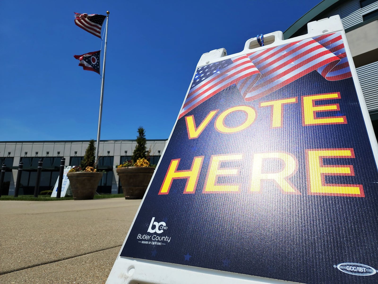 A "vote here" sign is seen at the Butler County Board of Elections headquarters in Hamilton on May 2, 2022. NICK GRAHAM/STAFF