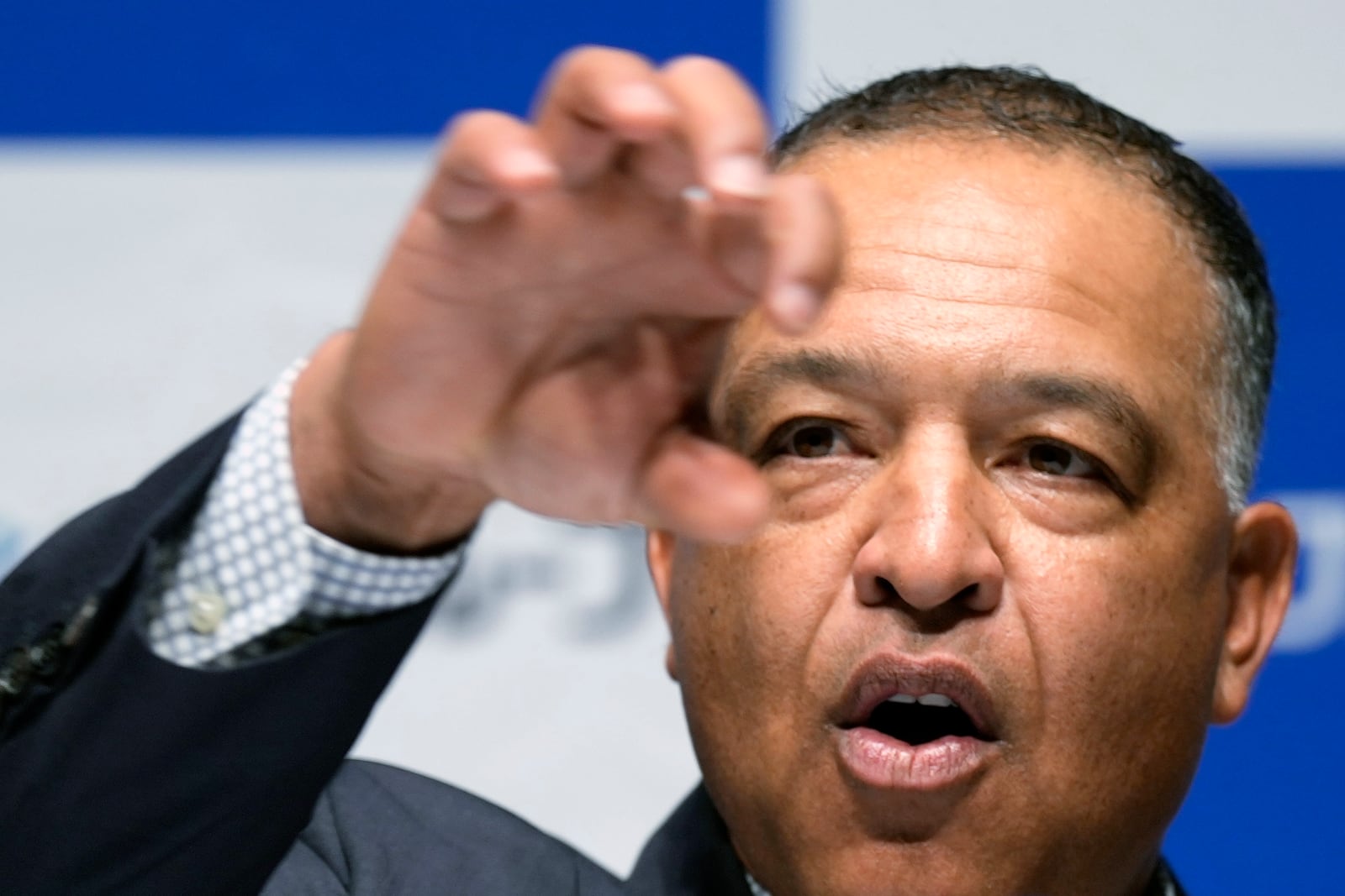 Los Angeles Dodgers manager Dave Roberts attends a press conference on the commercials he appears Wednesday, Dec. 4, 2024, in Tokyo. (AP Photo/Eugene Hoshiko)