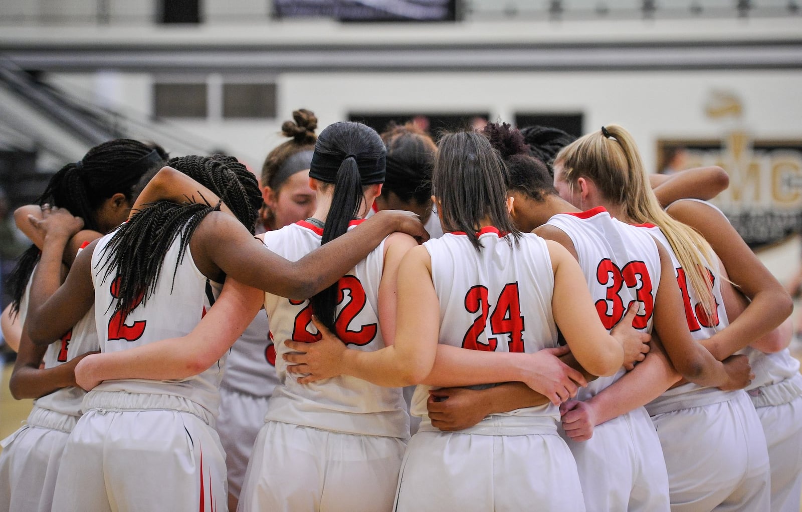 Fairfield’s players huddle Wednesday night at Lakota East, where they dropped a 61-56 overtime decision to West Clermont in Division I sectional action. NICK GRAHAM/STAFF