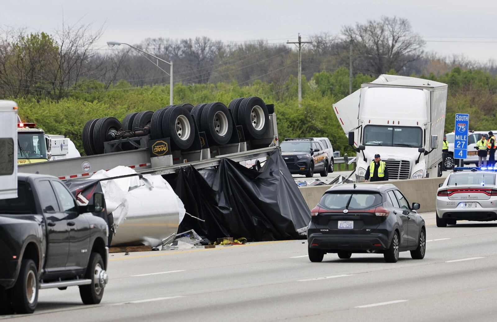 Two semis were involved in a crash on I-75 near the rest areas south of Monroe exit exit in Butler County on Tues., April 19, 2022. One person died, according to the Ohio State Highway Patrol. NICK GRAHAM/STAFF