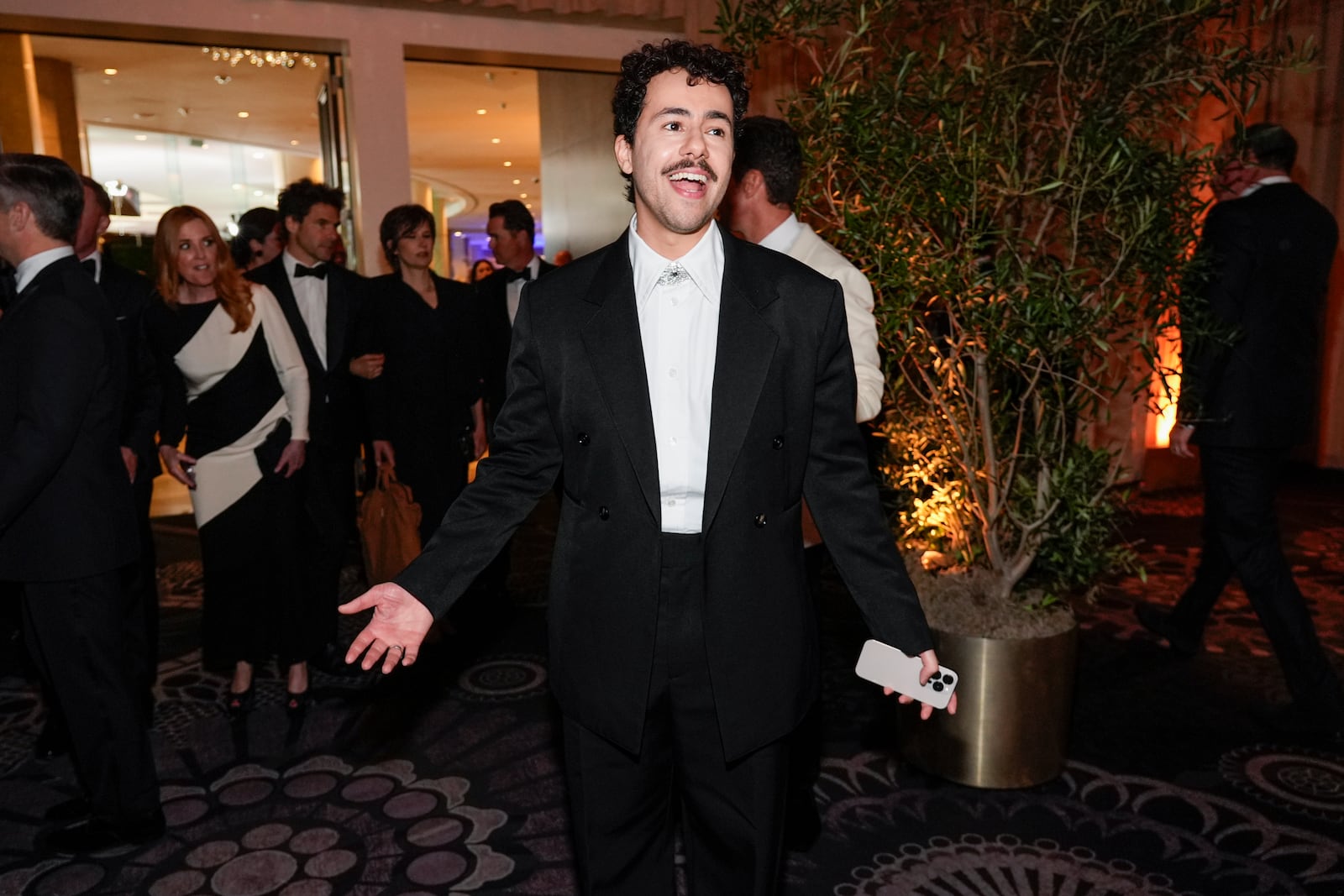 FILE - Ramy Youssef arrives at the 82nd Golden Globes at the Beverly Hilton in Beverly Hills, Calif., Jan. 5, 2025. (AP Photo/Chris Pizzello, File)