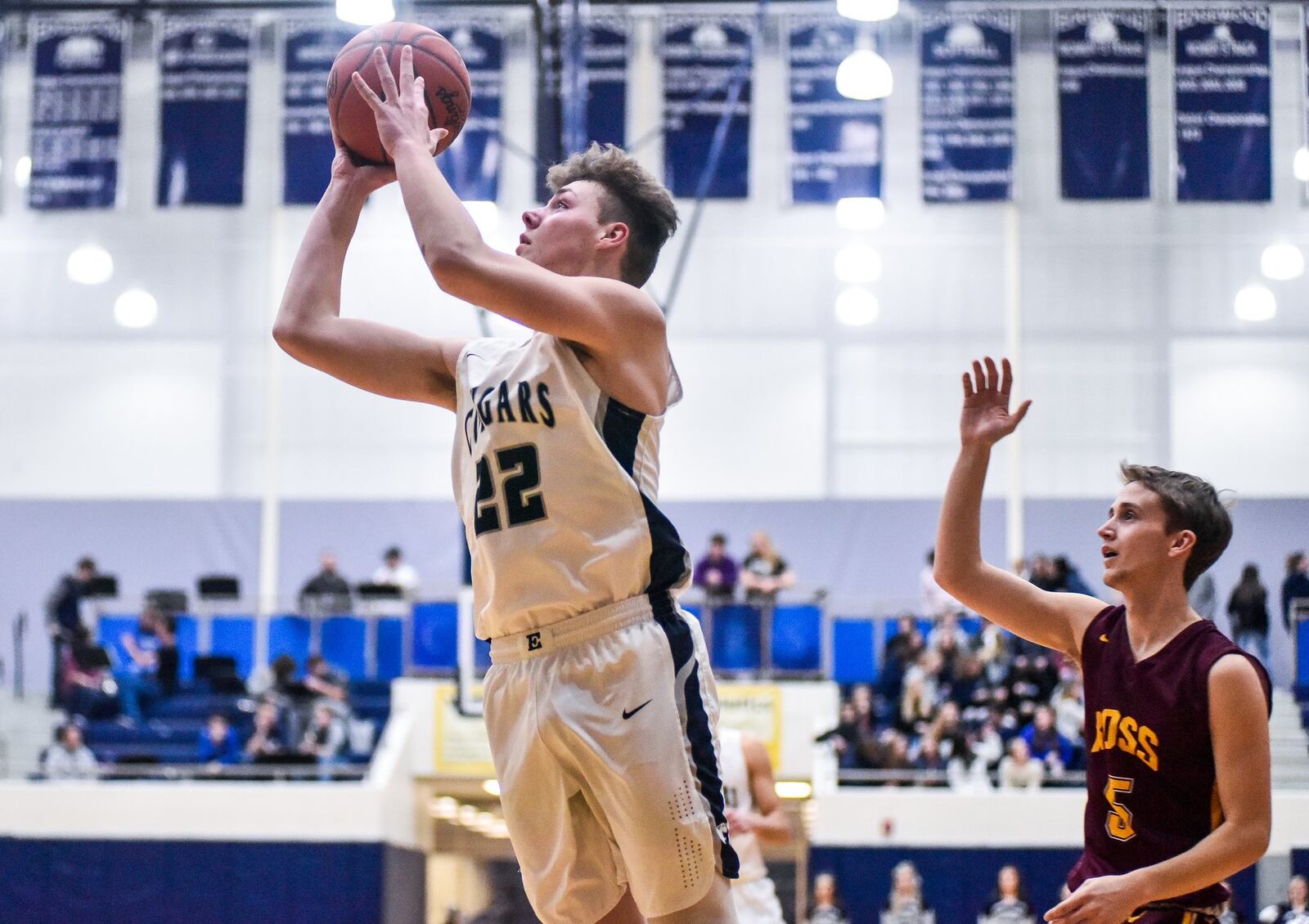 Edgewood’s Eric Brooks gets past Ben Yeager of Ross and puts up a shot during Friday night’s game in St. Clair Township. Visiting Ross won 49-34. NICK GRAHAM/STAFF