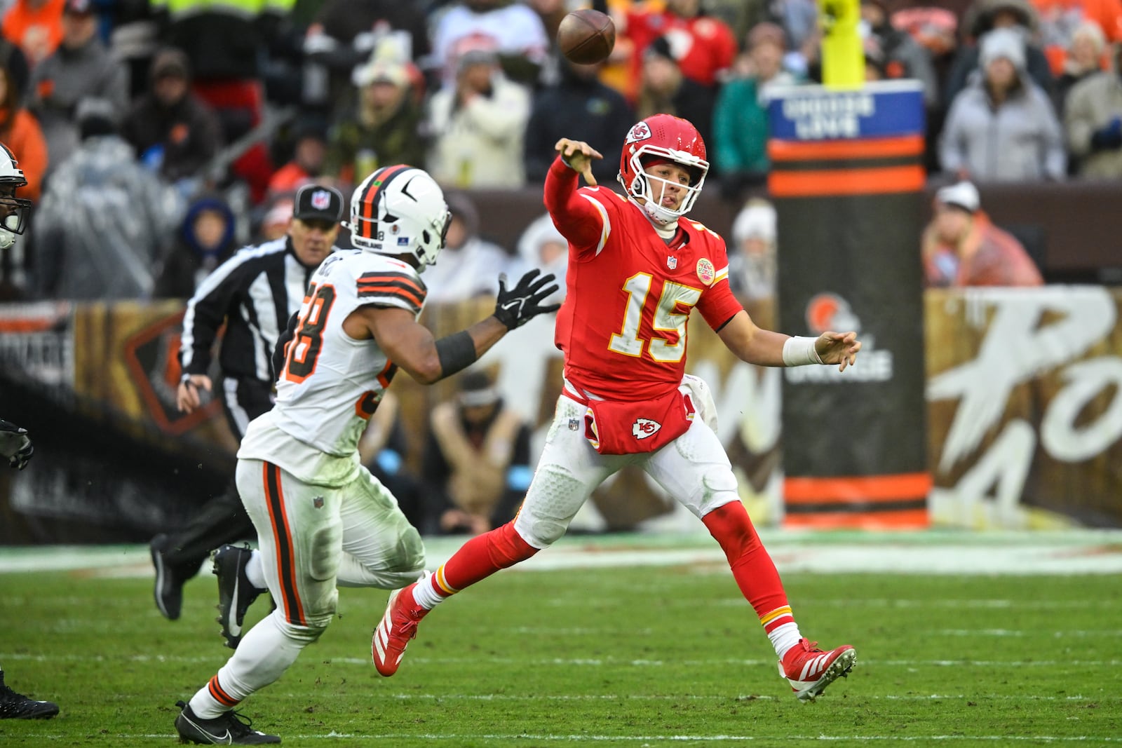 Kansas City Chiefs quarterback Patrick Mahomes (15) passes against the Cleveland Browns during the second half of an NFL football game, Sunday, Dec. 15, 2024, in Cleveland. (AP Photo/David Richard)