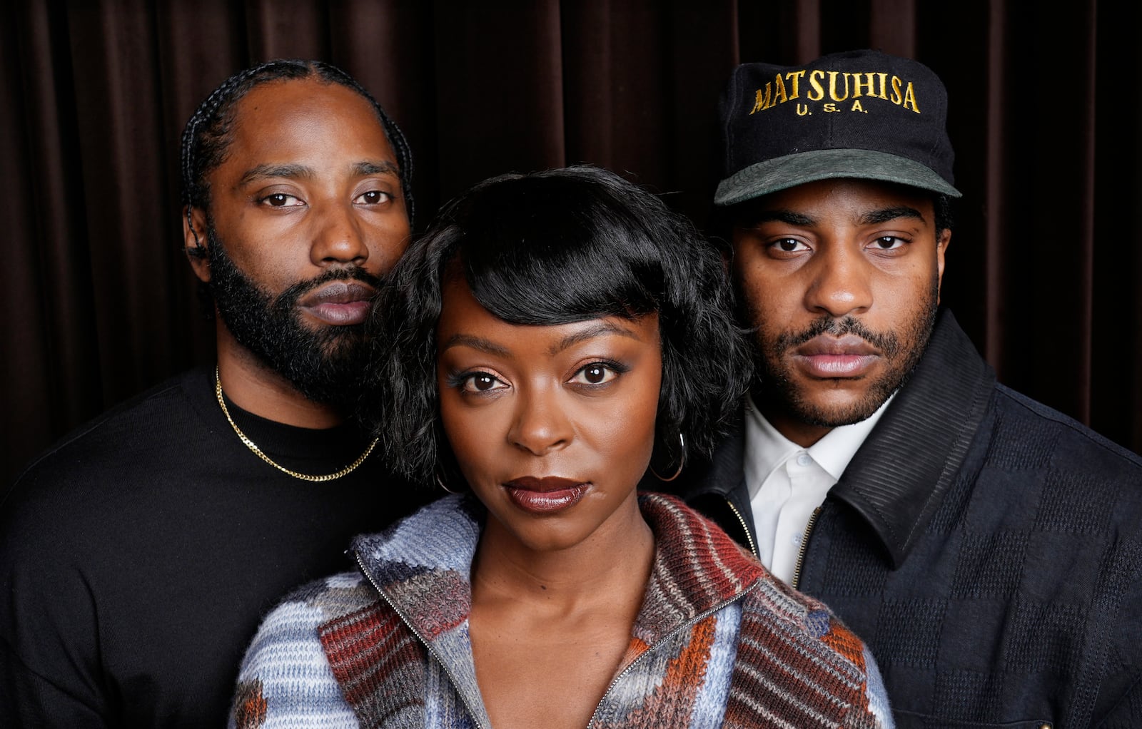 FILE - Malcolm Washington, right, director/co-screenwriter of the film "The Piano Lesson," poses with his brother and cast member John David Washington, left, and cast member Danielle Deadwyler during the Toronto International Film Festival on Sept. 9, 2024. (AP Photo/Chris Pizzello, File)