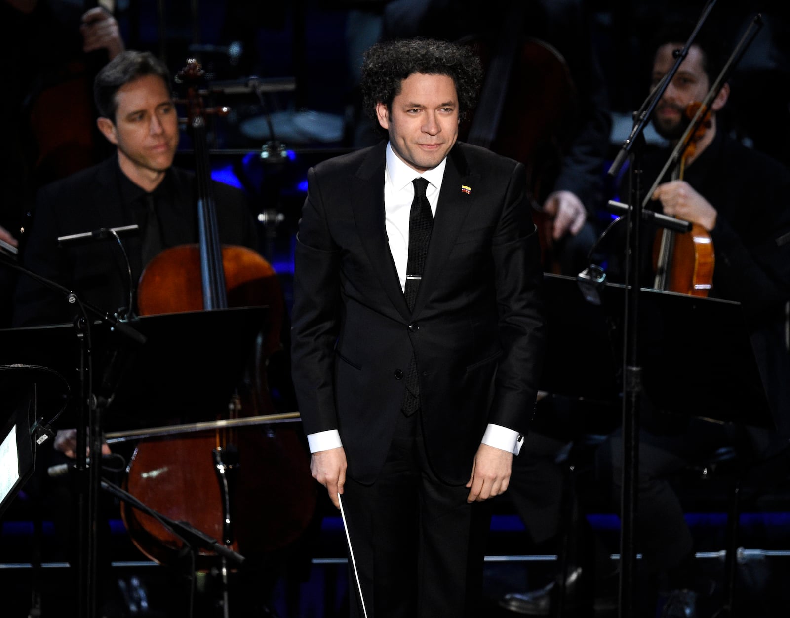 FILE - Conductor Gustavo Dudamel appears with the LA Philharmonic during the "In Memoriam" presentation at the Oscars in Los Angeles on Feb. 24, 2019. (Photo by Chris Pizzello/Invision/AP, File)