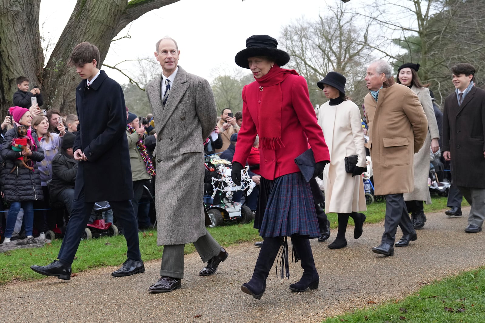 Prince Edward, second left, and Princess Anne arrive for the the Christmas day service at St Mary Magdalene Church in Sandringham in Norfolk, England, Wednesday, Dec. 25, 2024. (AP Photo/Jon Super)