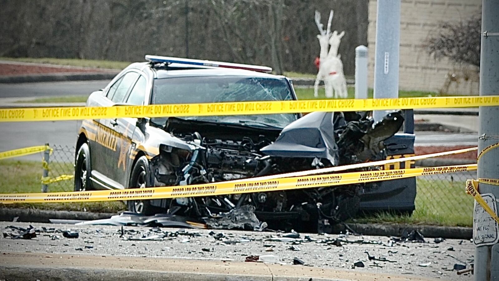 A Montgomery County sheriff’s cruiser at U.S. 35 and Liscum Drive had severe damage Monday, Jan. 8, 2024. Dayton police reported U.S. 35 was closed in the area due to police activity. MARSHALL GORBY \STAFF