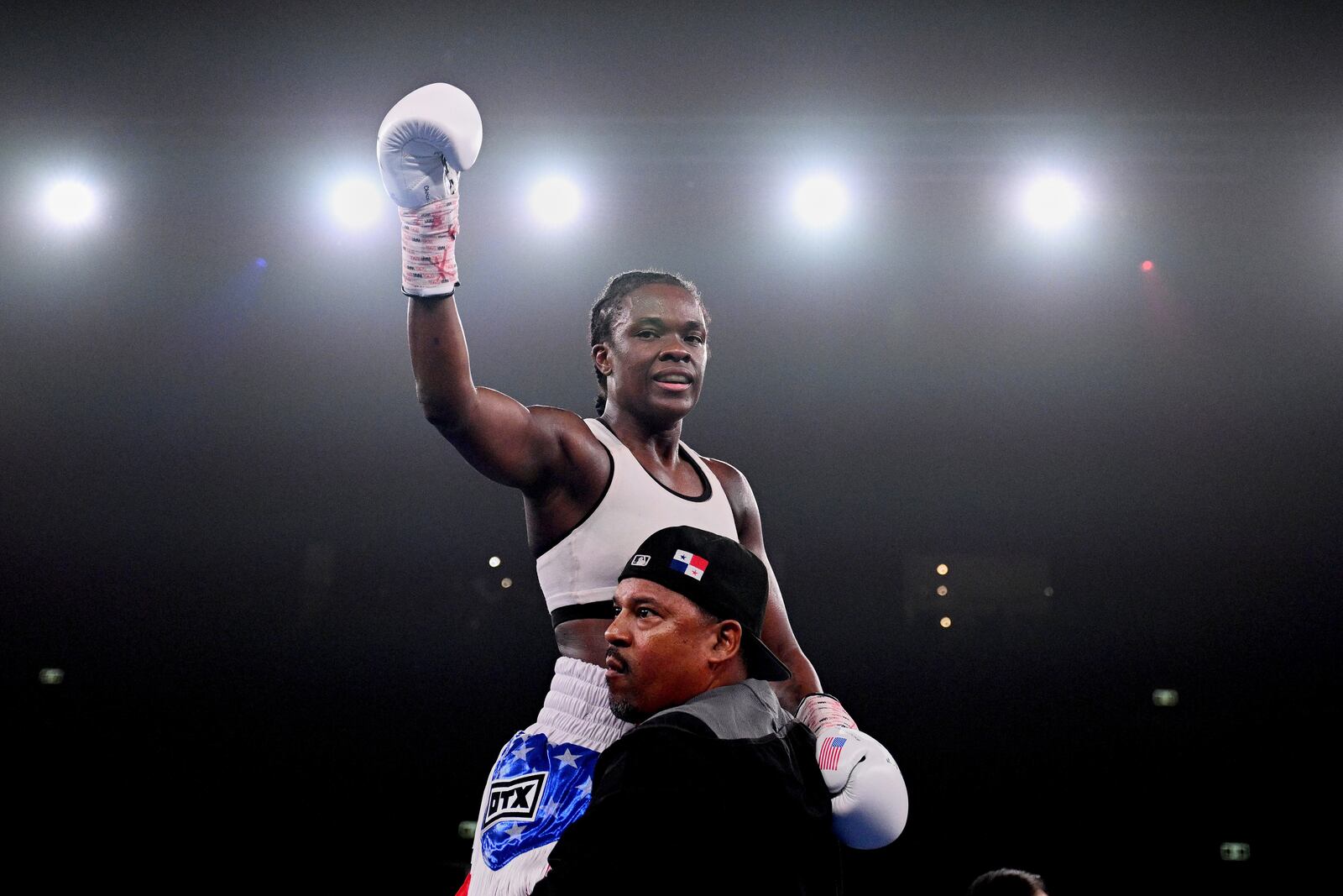 Former US police officer Tiara Brown reacts after defeating Skye Nicolson, of Australia, in a split-decision to win the WBC world featherweight champion at Qudos Bank Arena in Sydney, Saturday, March 22, 2025. (Dan Himbrechts/AAP Image via AP)