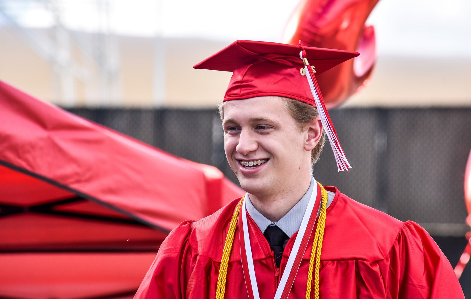 Madison High School drive-thru graduation ceremony at Land of Illusion