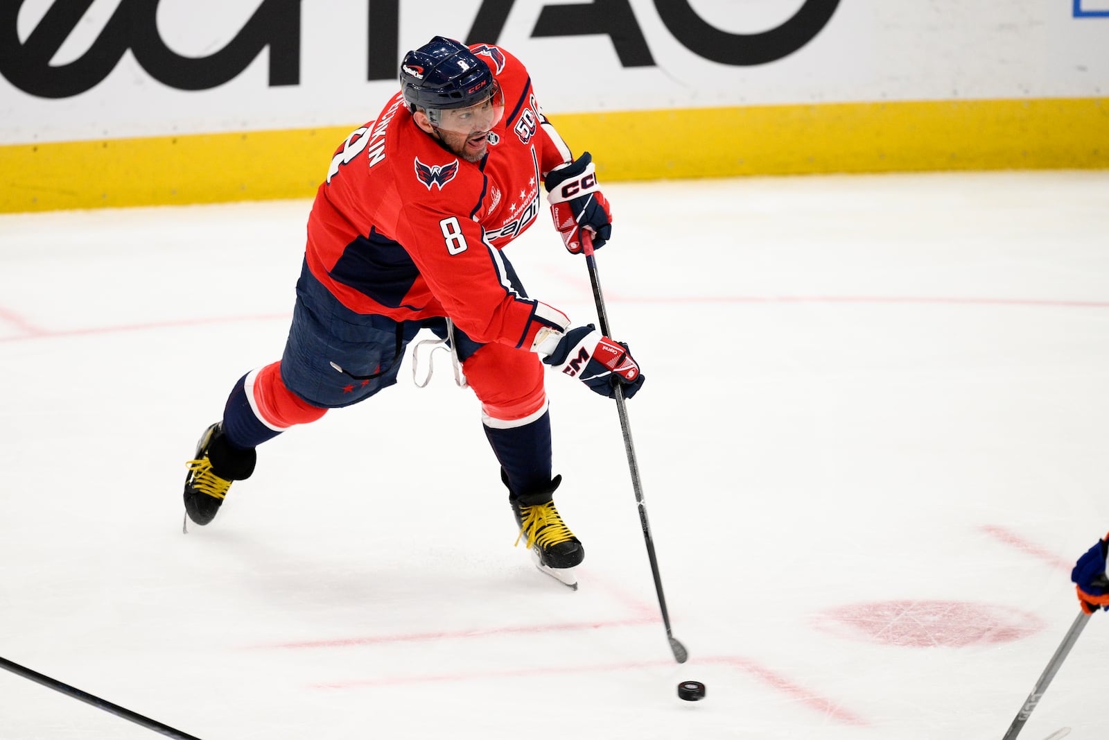 Washington Capitals left wing Alex Ovechkin (8) shoots during the third period of an NHL hockey game against the Edmonton Oilers, Sunday, Feb. 23, 2025, in Washington. (AP Photo/Nick Wass)