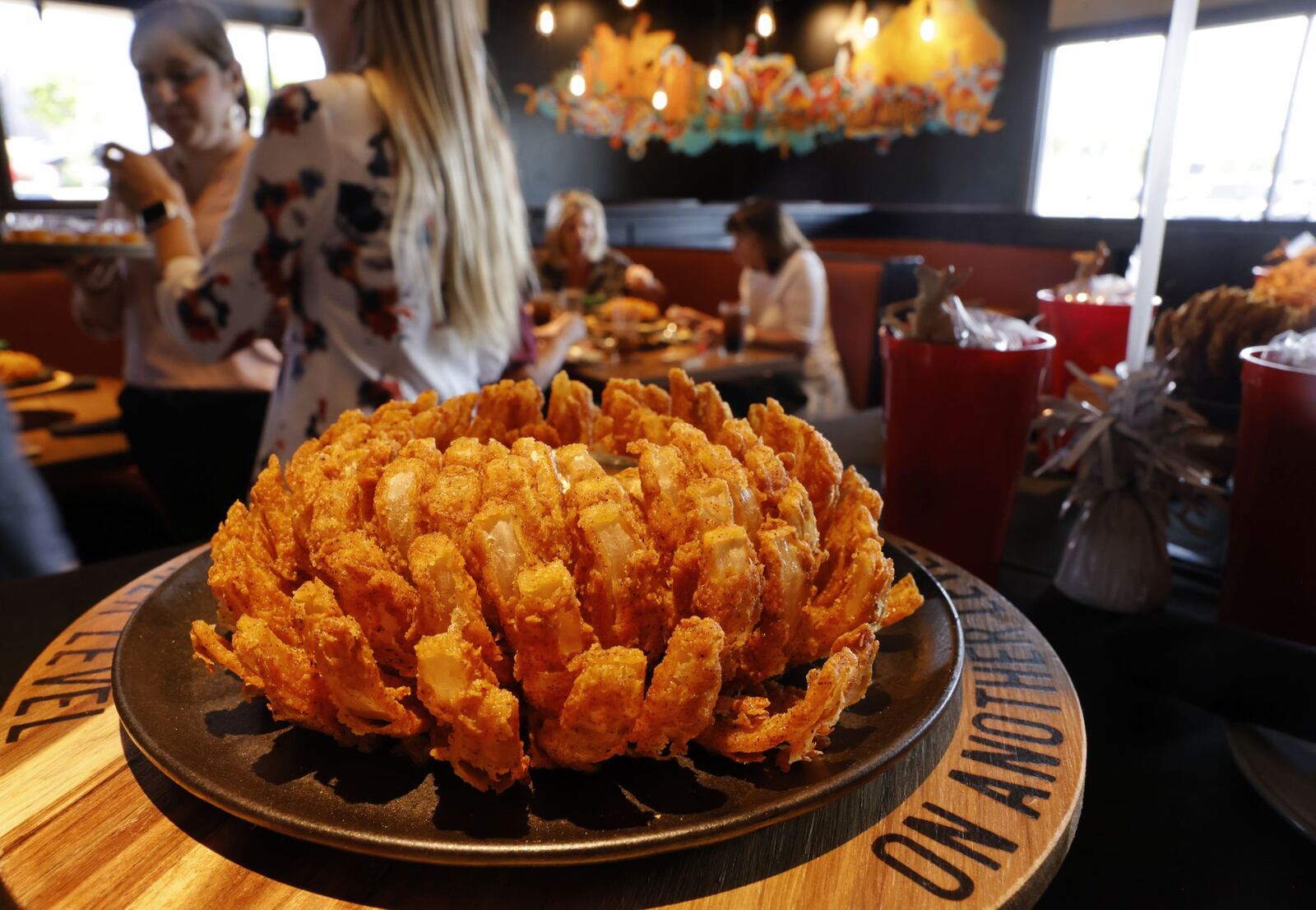 A ribbon cutting and grand opening was Wednesday, Aug. 14, 2024 for the new Outback Steakhouse at 7530 Foster Lane in West Chester Township. The restaurant is across Liberty Way from Liberty Center. NICK GRAHAM/STAFF