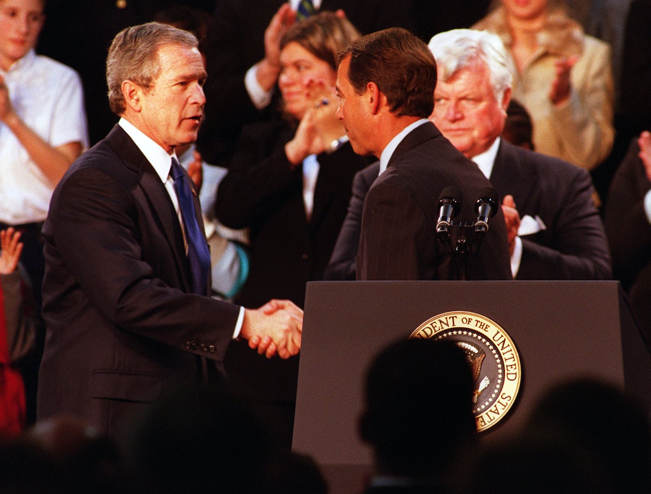 President George W. Bush signing No Child Left Behind Act at Hamilton High School Jan. 8, 2002.