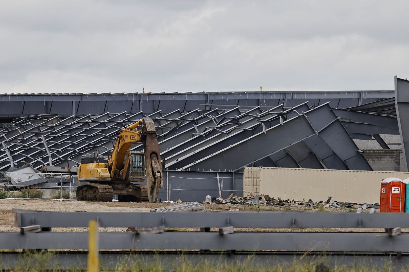 Construction continues on Spooky Nook Sports Champion Mill Monday, Aug. 30, 2021 in Hamilton. A collapsed partially completed steel structure fir a building that was to include an indoor soccer/football/lacrosse field that blew over earlier this year remains on the ground. NICK GRAHAM / STAFF