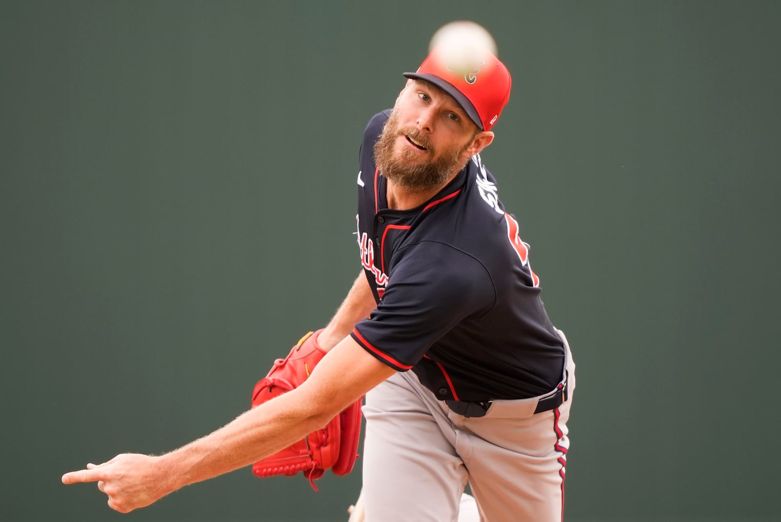 Atlanta Braves pitcher Chris Sale throws in the first inning of a spring training baseball game against the Minnesota Twins in Fort Myers, Fla., Saturday, Feb. 22, 2025. (AP Photo/Gerald Herbert)