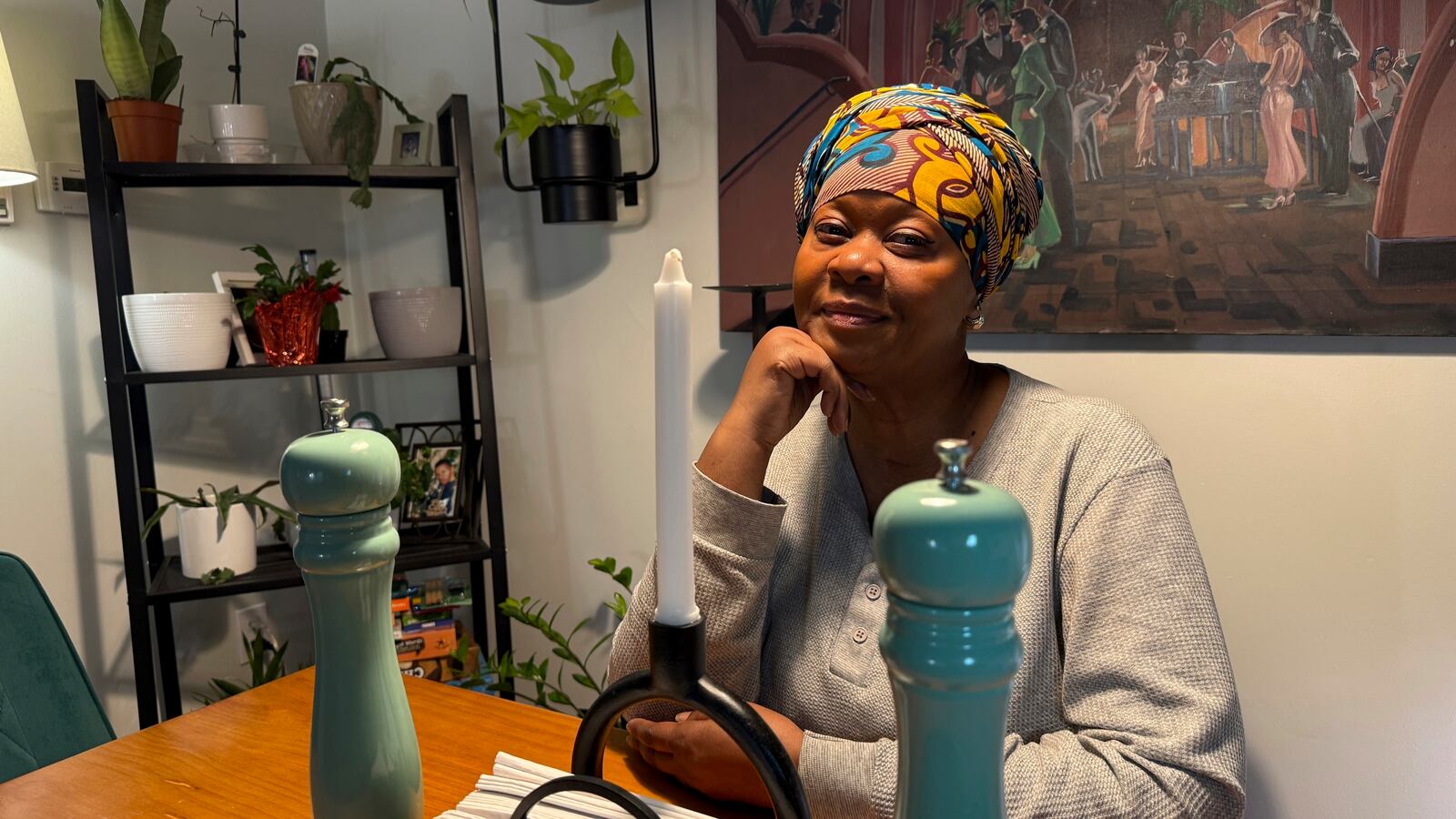 Julieta Lopez poses for a photo at her Boston home, Friday, Jan. 10, 2025, some two years after she bought her first home, capping a 30-year pursuit of homeownership. (AP Photo/Rodrique Ngowi)