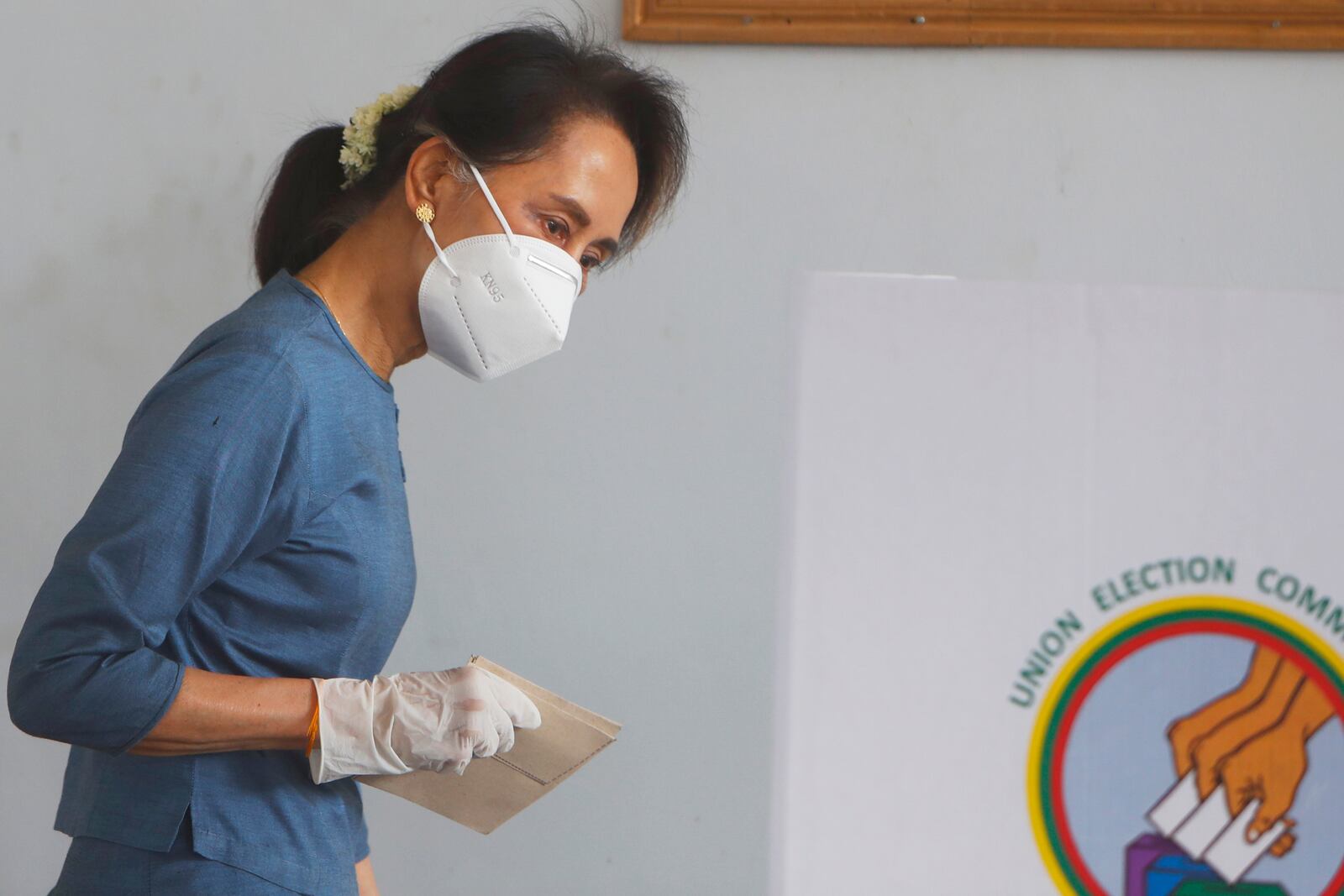 FILE - Aung San Suu Kyi prepares to make an early voting for upcoming Nov. 8 general election at Union Election Commission office in Naypyitaw, Myanmar on Oct. 29, 2020.(AP Photo/Aung Shine Oo, File)