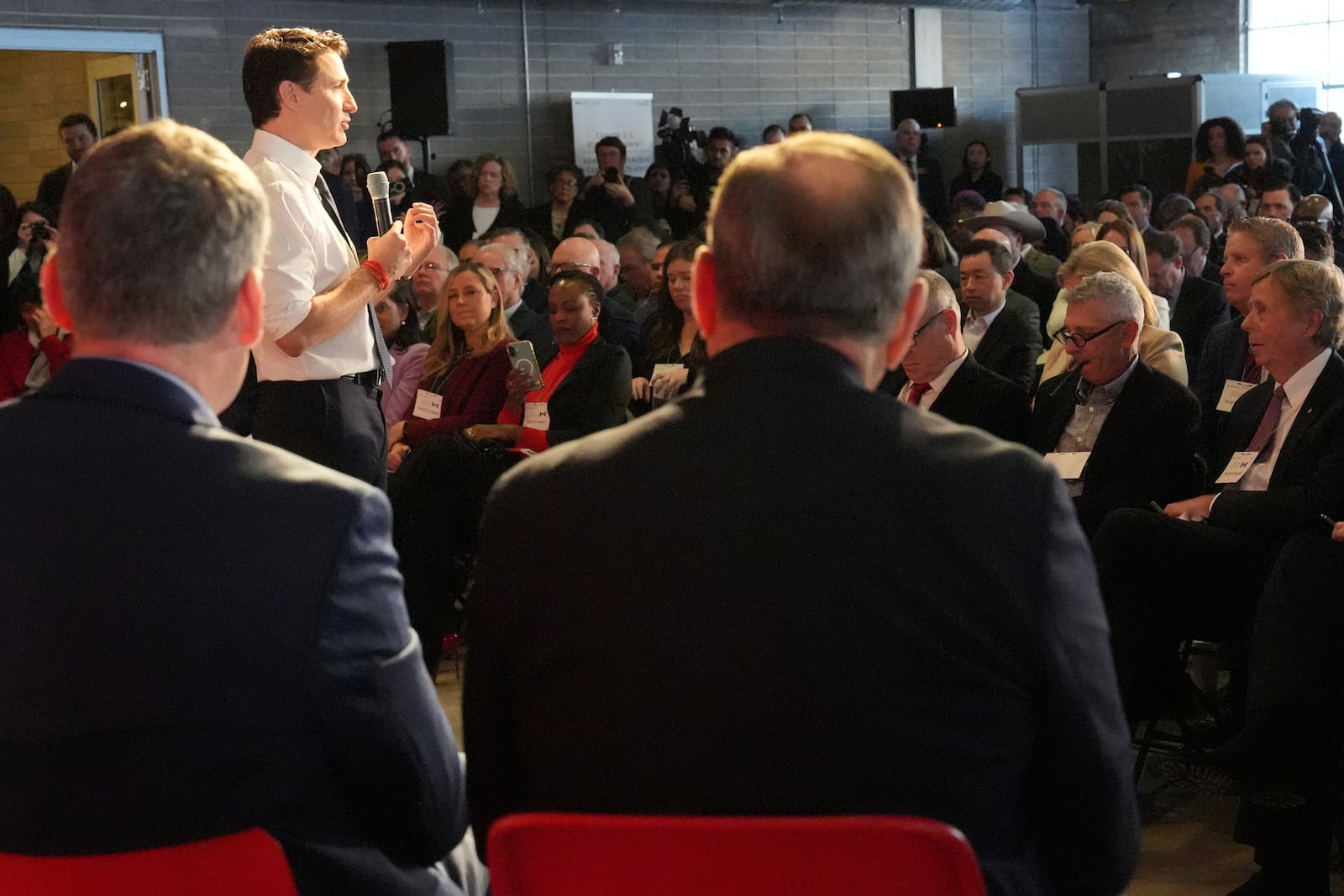 Prime Minister Justin Trudeau addresses a Canada-U.S. economic summit in Toronto, Friday, Feb. 7, 2025. (Frank Gunn /The Canadian Press via AP)