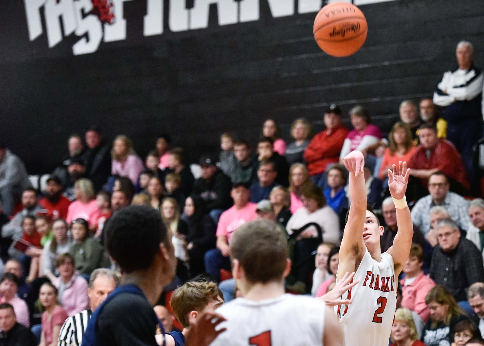 Franklin’s Payton Knott launches a shot during Friday night’s game against Monroe at Darrell Hedric Gym in Franklin. NICK GRAHAM/STAFF