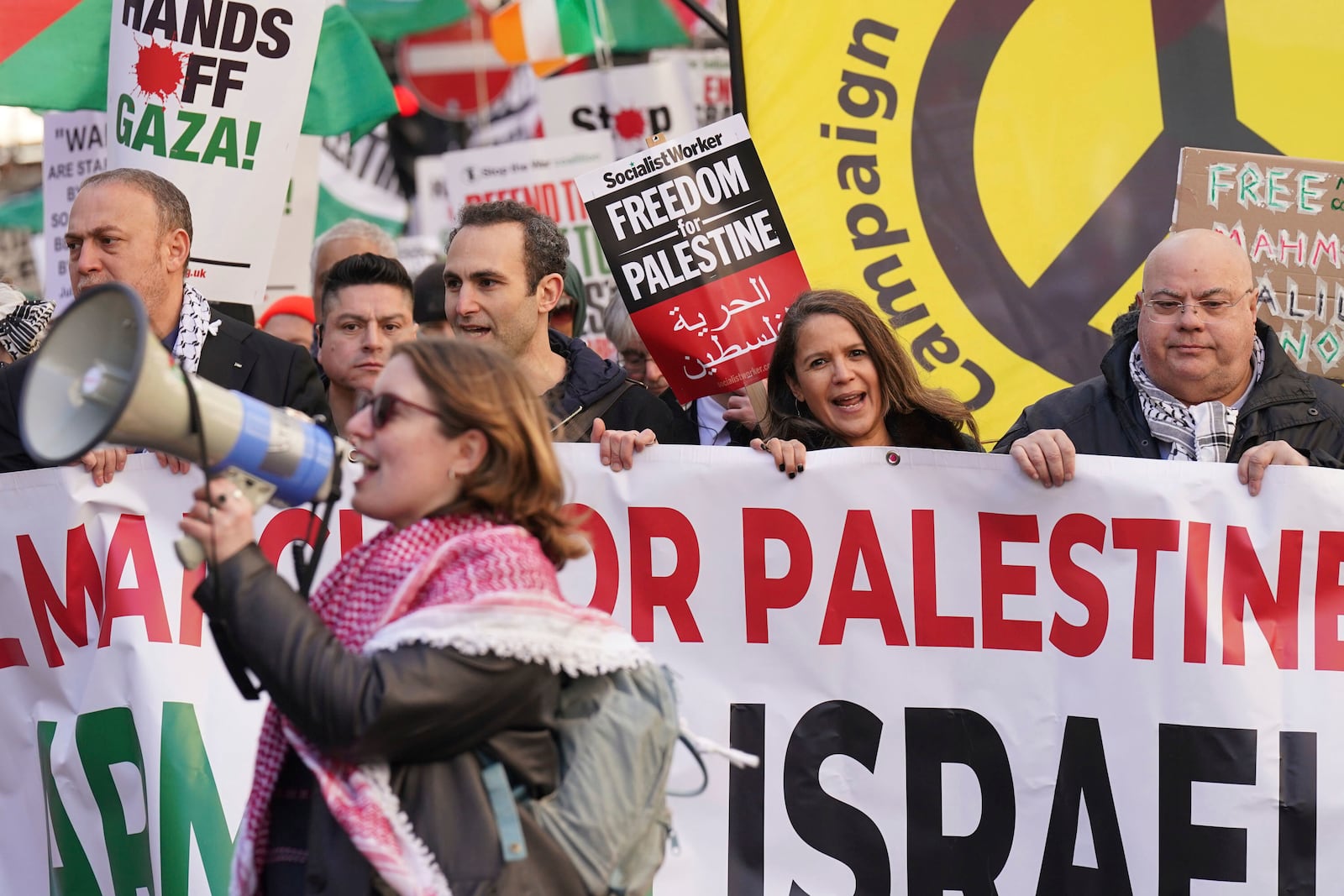 People take part in a pro-Palestine march in central London, Saturday, March 15, 2025. (Stefan Rousseau/PA via AP)