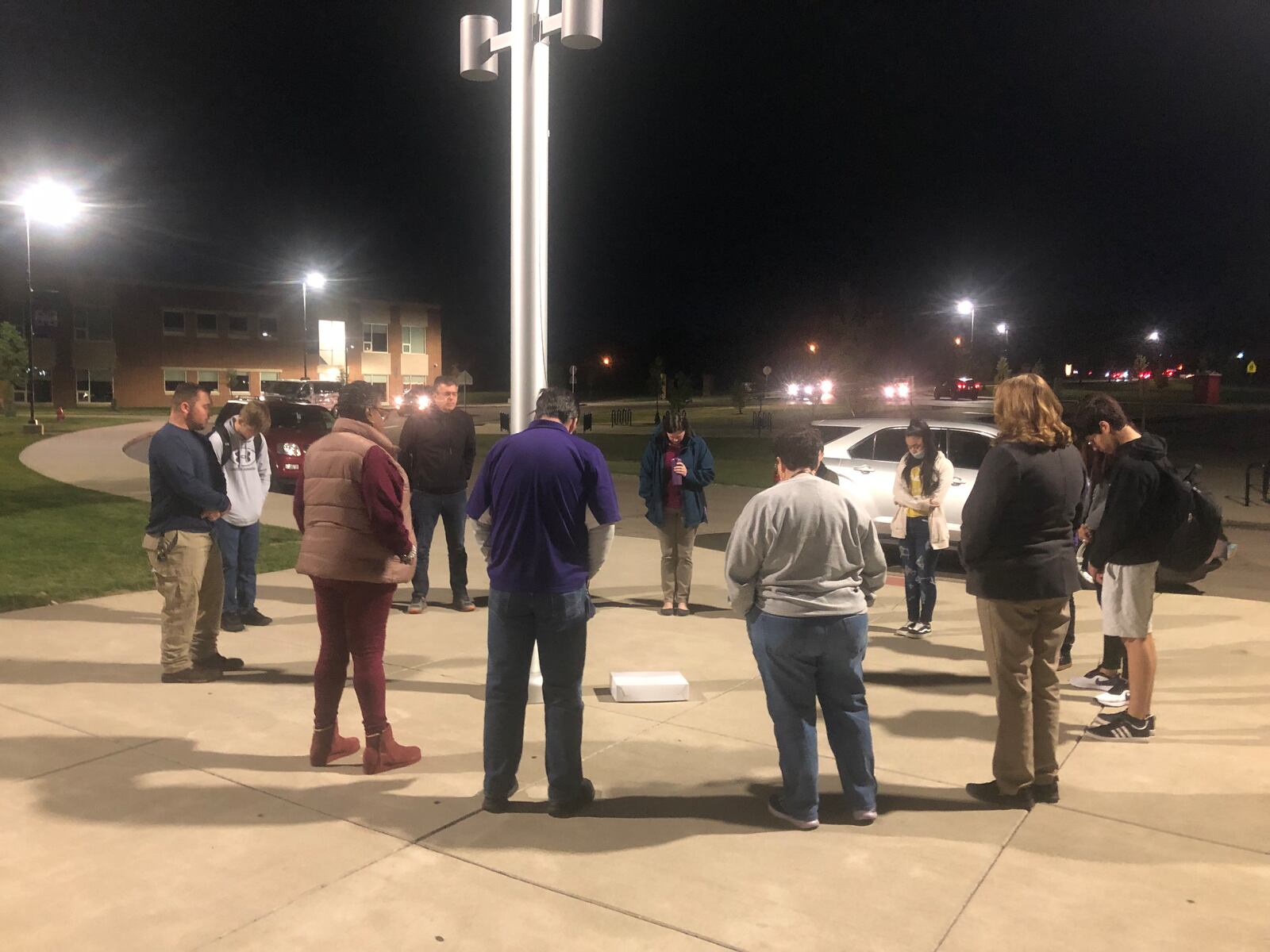 On Wednesday morning, "See You at the Pole" day, numerous students and staff at Middletown High School prayed around the flag pole. RICK McCRABB/STAFF