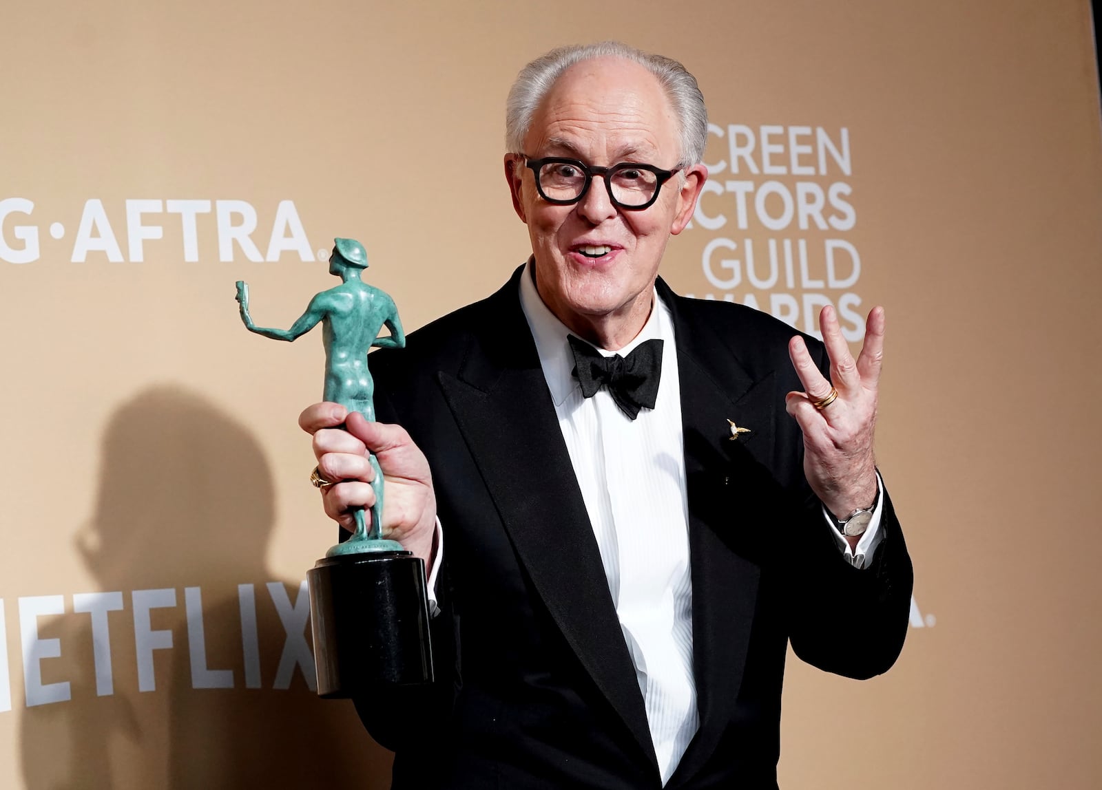 John Lithgow poses with the award for outstanding performance by a cast in a motion picture for "Conclave" during the 31st annual Screen Actors Guild Awards on Sunday, Feb. 23, 2025, at the Shrine Auditorium in Los Angeles. (Photo by Jordan Strauss/Invision/AP)