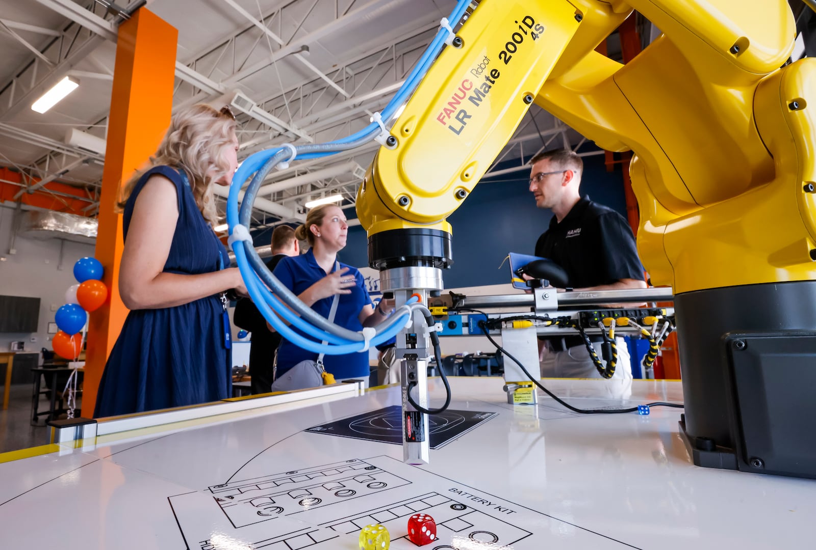 Butler Tech held a ribbon cutting for the adult education Robotics lab and Industrial Maintenance Technology lab at their LeSourdsville campus Wednesday, Aug. 21, 2024. NICK GRAHAM/STAFF