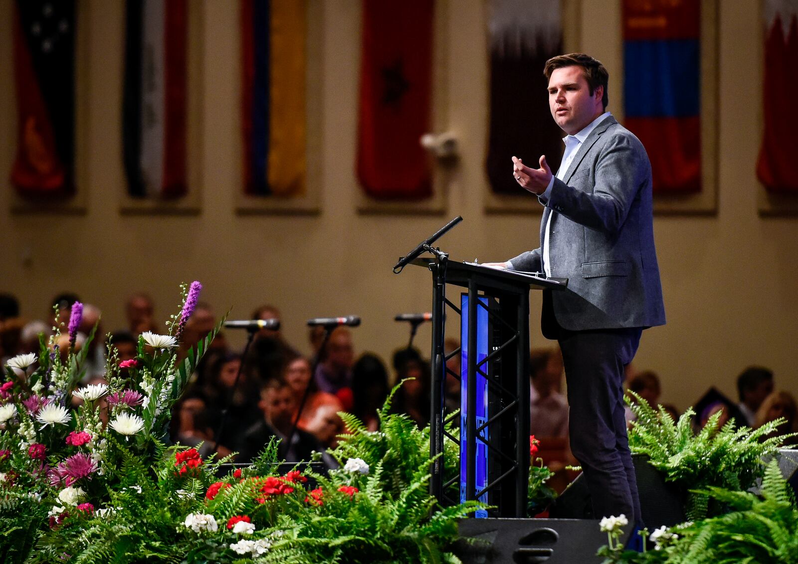 Distinguished Alumni Speaker J.D. Vance offers his advice to the Middletown High School graduating class of 2017 during their commencement ceremony Tuesday, May 23 at Princeton Pike Church of God in Liberty Township. NICK GRAHAM/STAFF