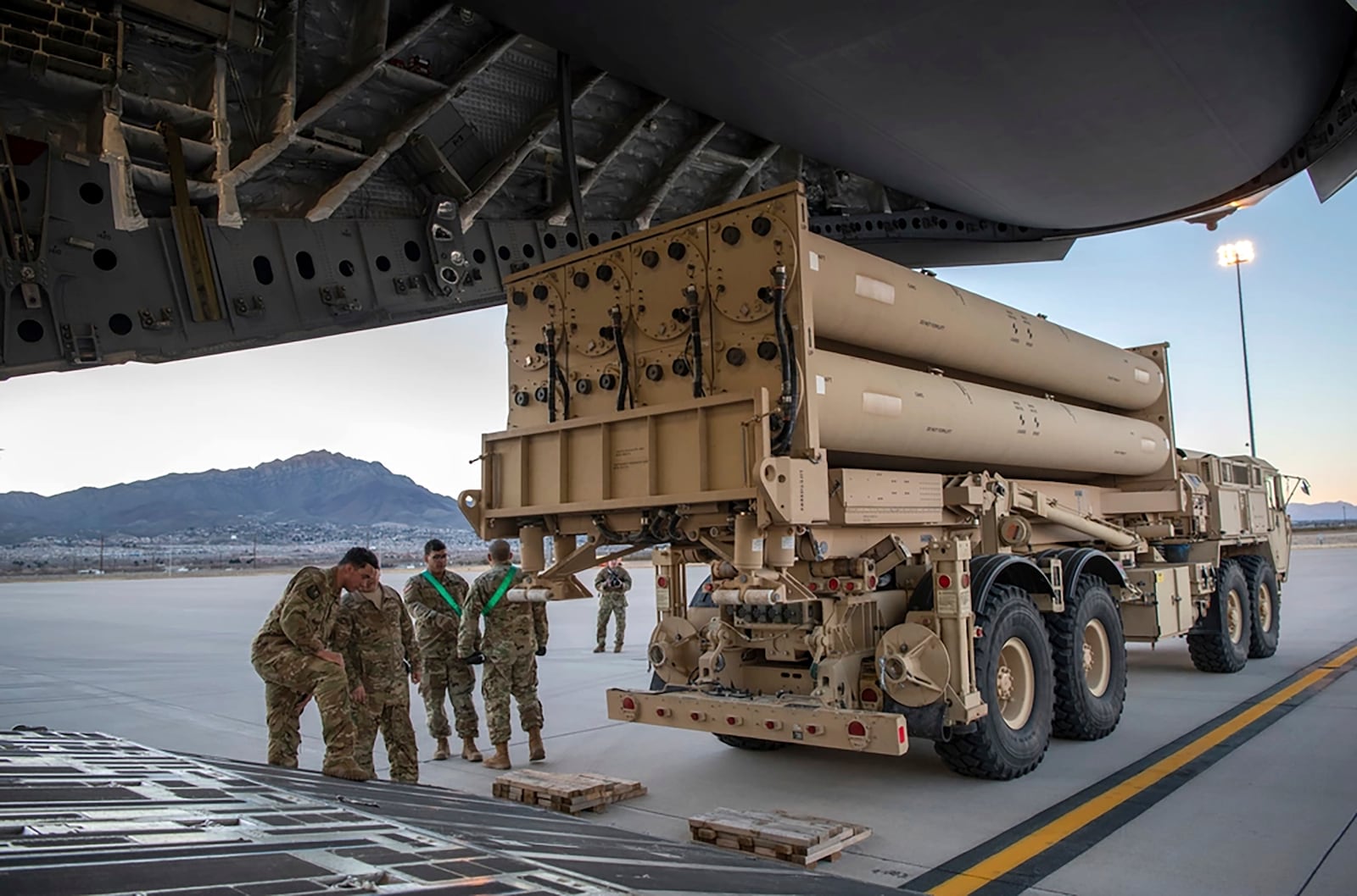 This image provided by the U.S. Air Force shows the U.S. Army Terminal High Altitude Area Defense launching station preparing to load onto a 4th Airlift Squadron C-17 Globemaster III at Fort Bliss, Texas, Feb. 23, 2019. (Staff Sgt. Cory D. Payne/U.S. Air Force via AP)