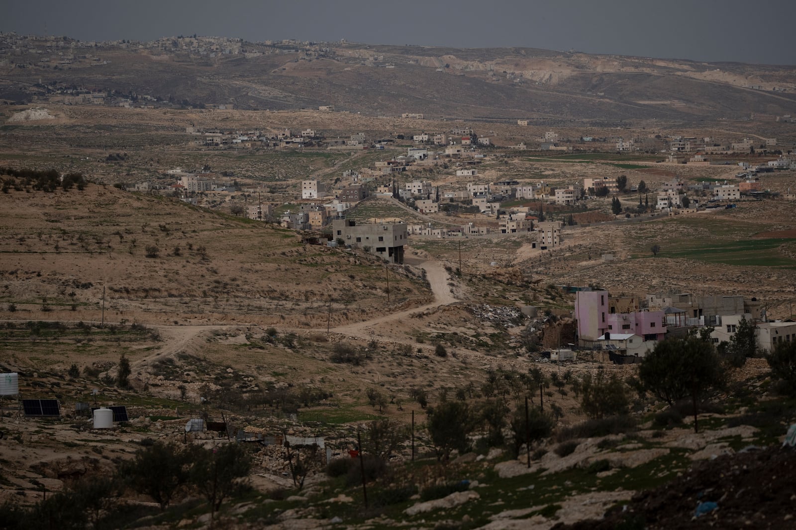 Palestinian houses are seen in the West Bank village of Tuwani, Monday, March 3, 2025. (AP Photo/Leo Correa)