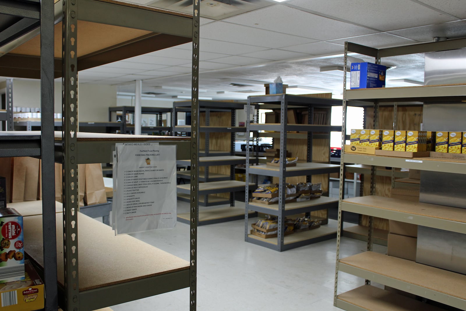 Too many of the shelves at the Fairfield Food Pantry are empty. The pantry is in dire need of donations. Photo: Sue Kiesewetter/contributor