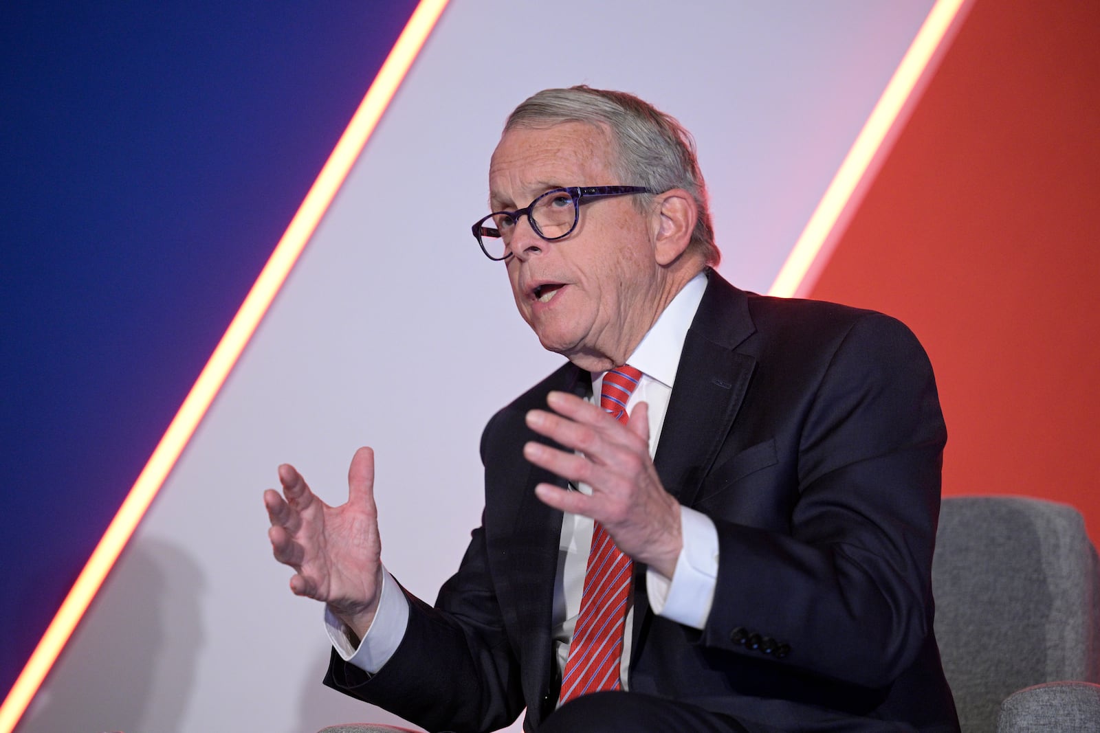 Ohio Gov. Mike DeWine answers a question while taking part in a panel discussion during a Republican Governors Association conference, Wednesday, Nov. 16, 2022, in Orlando, Fla. (AP Photo/Phelan M. Ebenhack)