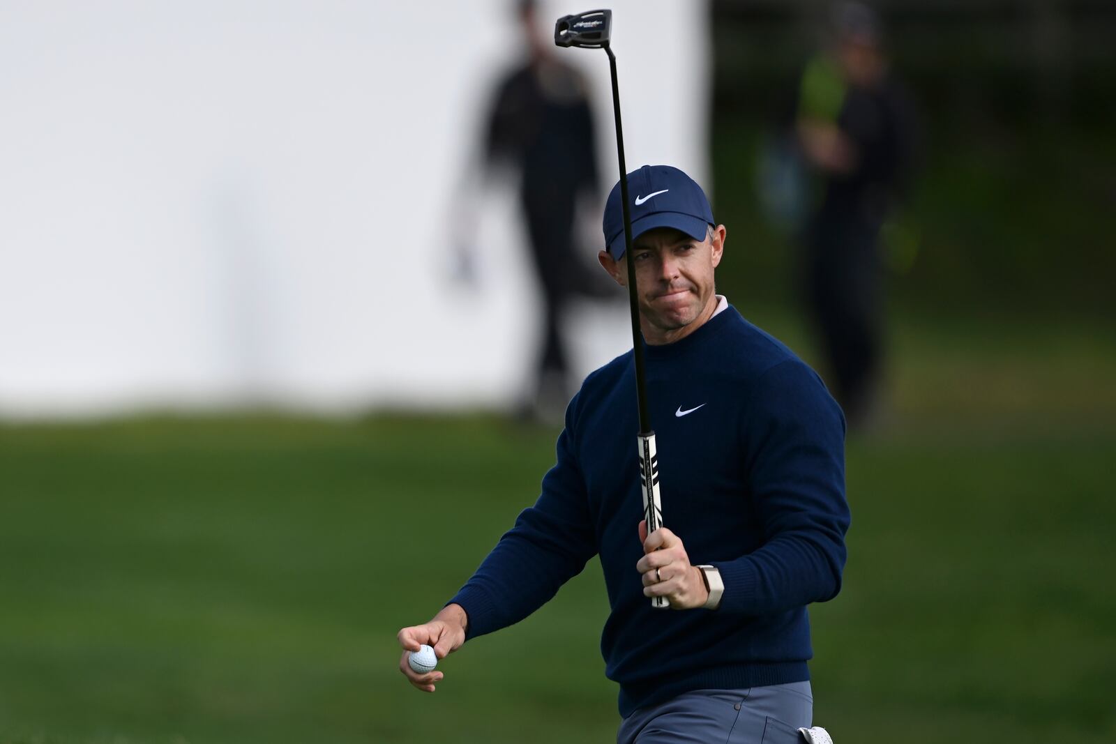 Rory McIlroy, of Northern Ireland, reacts after making a birdie putt on the 15th hole at Pebble Beach Golf Links during the final round of the AT&T Pebble Beach Pro-Am golf tournament, Sunday, Feb. 2, 2025, in Pebble Beach, Calif. (AP Photo/Nic Coury)