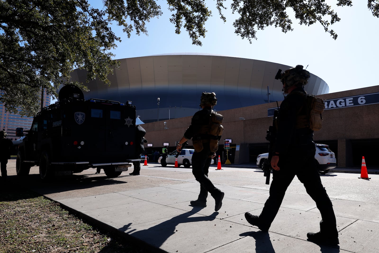 Local SWAT teams patrol outside the Ceasars Superdome ahead of the Sugar Bowl NCAA College Football Playoff game, Thursday, Jan. 2, 2025, in New Orleans. (AP Photo/Butch Dill)