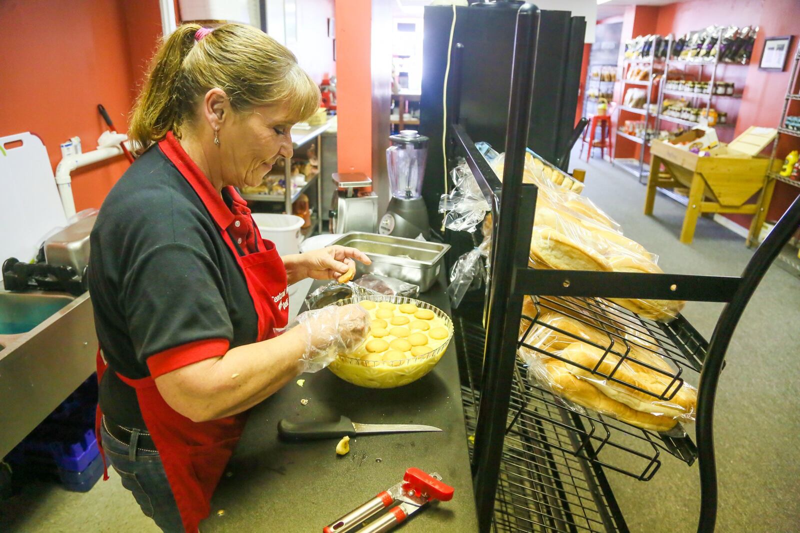 Peggy Carroll makes banana pudding at Central Market & Deli in Middletown, which also offers a full deli. 