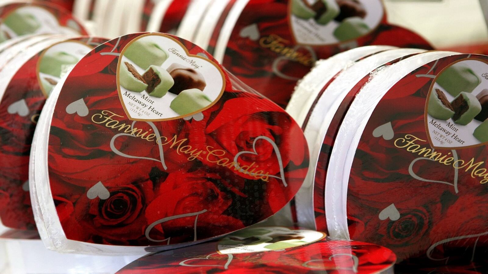 CHICAGO - FEBRUARY 10: Heart-shaped boxes of Mint Meltaway chocolates are seen in a Fannie May Candies store February 10, 2006 in Park Ridge, Illinois. With Valentine's Day just a few days away, consumers are reportedly spending more this year on sweets and such than in the past.  