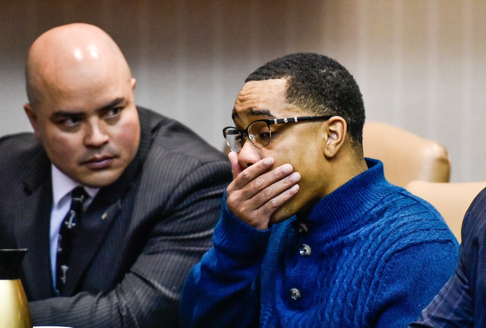 Michael Grevious II, sitting with attorneys James Bogen, left, and David Washington, right, was sentenced to life without the possiblility of parole Friday, April 27 in Butler County Common Pleas Court in Hamilton.