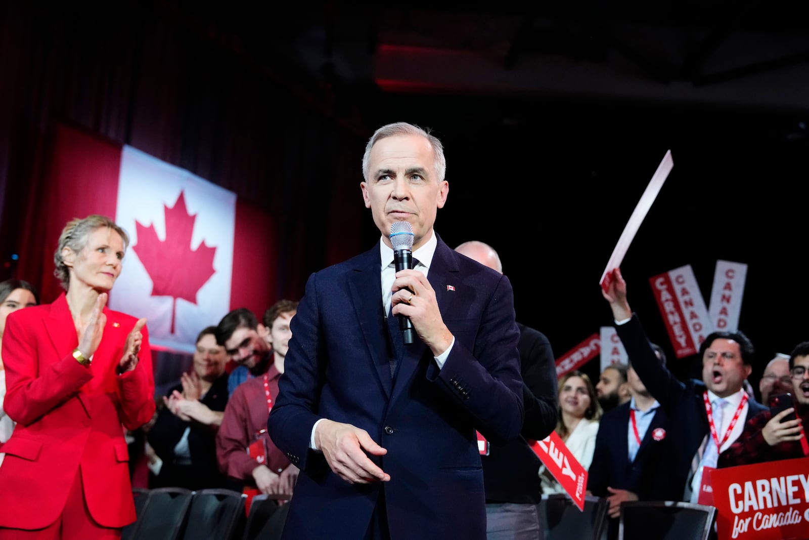 Liberal Party of Canada leadership candidate Mark Carney delivers a speech as he's introduced during the Liberal leadership announcement in Ottawa, Ontario, Sunday, March 9, 2025. (Justin Tang/The Canadian Press via AP)