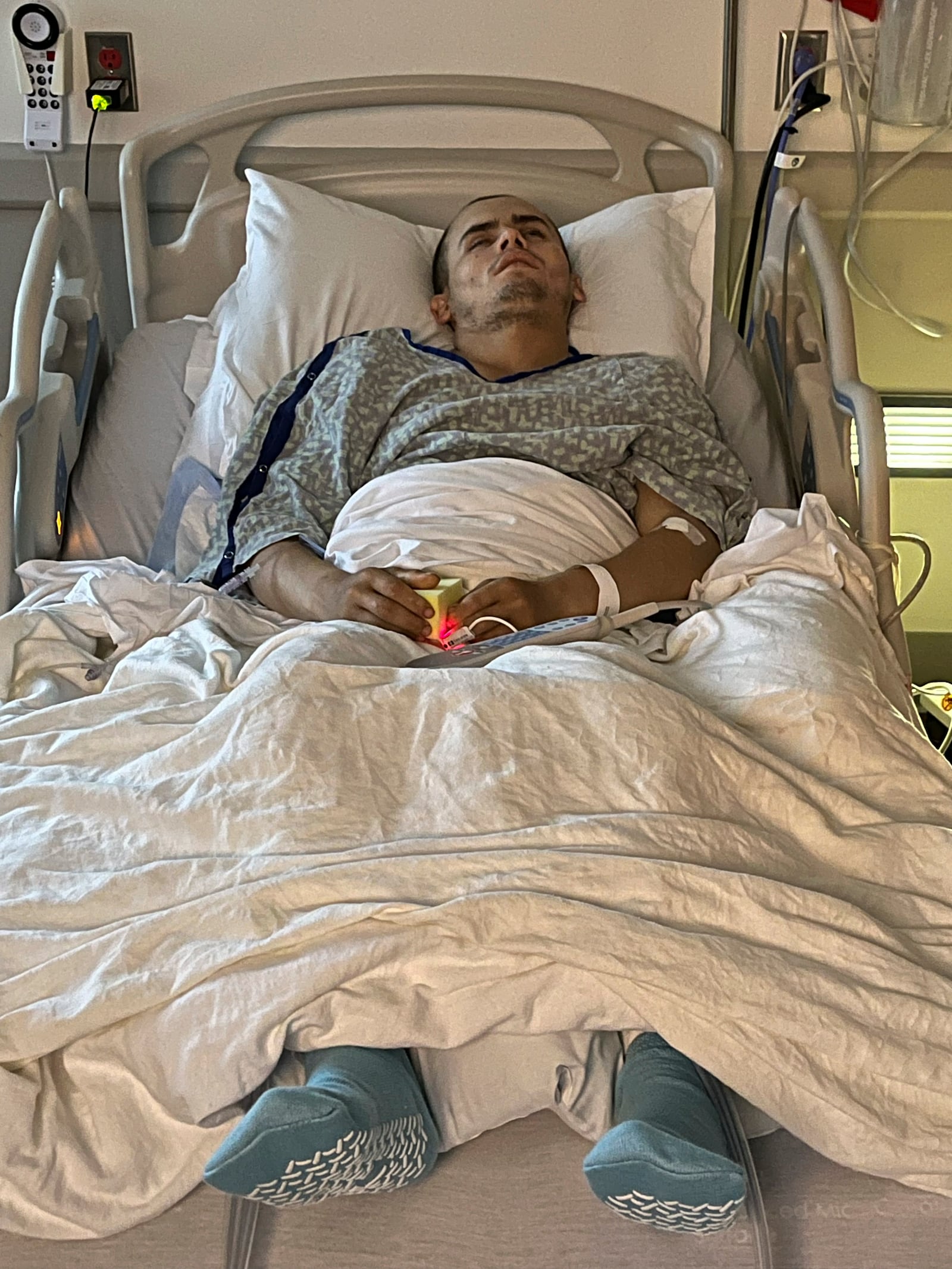 Jacob Rinehart rests in a hospital bed at the Beaufort Memorial Hospital on Oct. 11, 2023, in Beaufort, S.C. (Audrey Cox via AP)