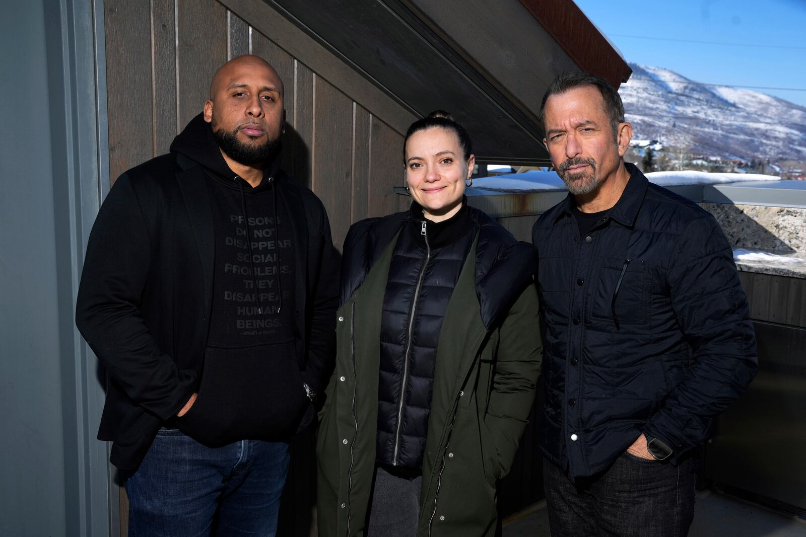 Producer Alex Duran, from left, director Charlotte Kaufman and director Andrew Jarecki pose for a portrait to promote the film "The Alabama Solution" during the Sundance Film Festival on Monday, Jan. 27, 2025, in Park City, Utah. (Photo by Charles Sykes/Invision/AP)