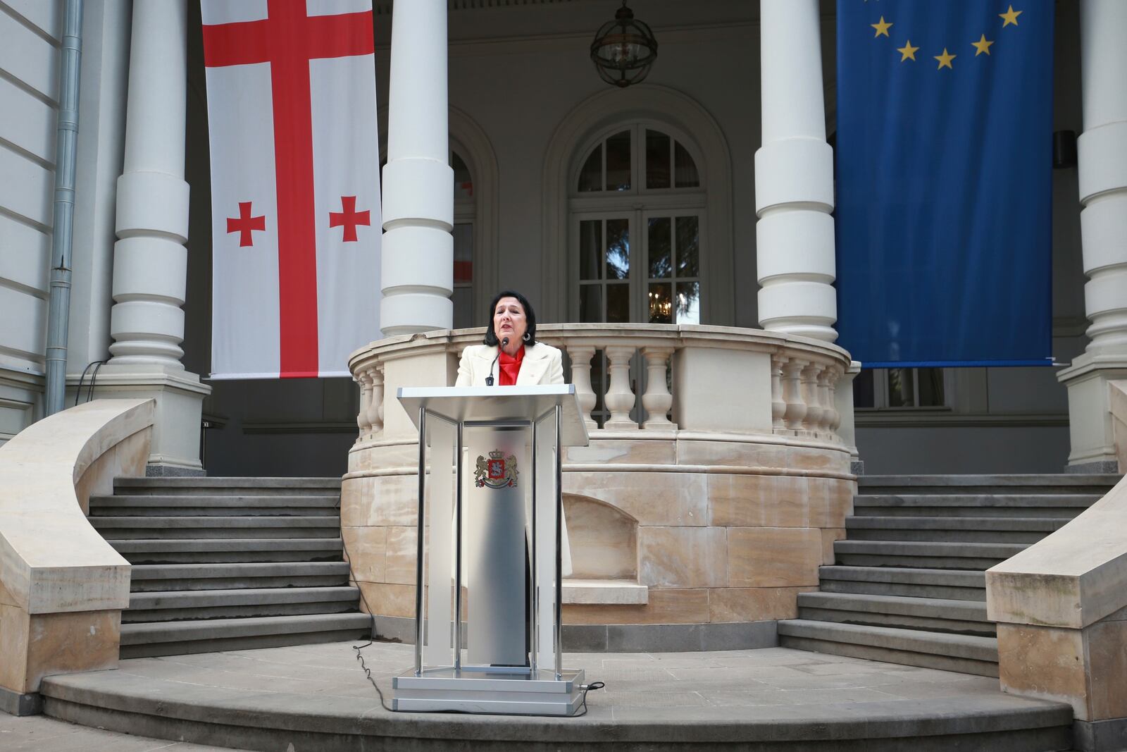 Outgoing Georgian President Salome Zourabichvili holds a press conference outside the Orbeliani Palace, the official residence of the President of Georgia, in Tbilisi, Georgia, Sunday, Dec. 29, 2024. (AP Photo/Zurab Tsertsvadze)