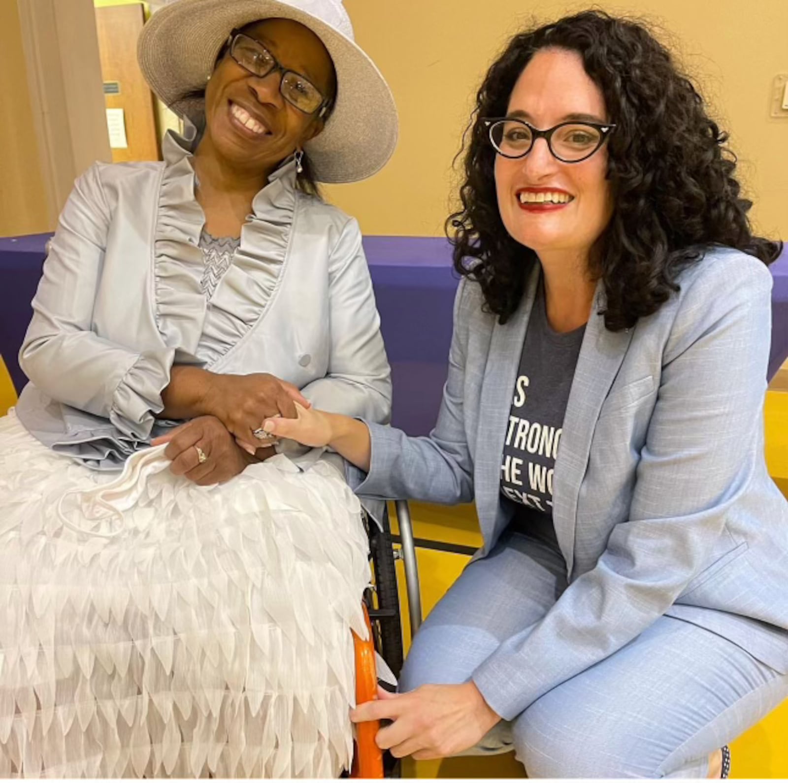 Breast cancer survivor Jen Papadakis at a motivational speaking event for women, Mount Enon Baptist Church. Seen here with Dr. Denise Gilmore, a community mentor who passed away in 2024.